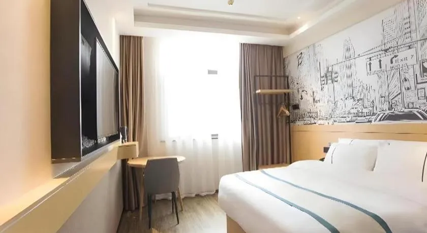 Bed in City Comfort Inn Jiujiang Gongqing Science and Technology College High-speed Railway Station