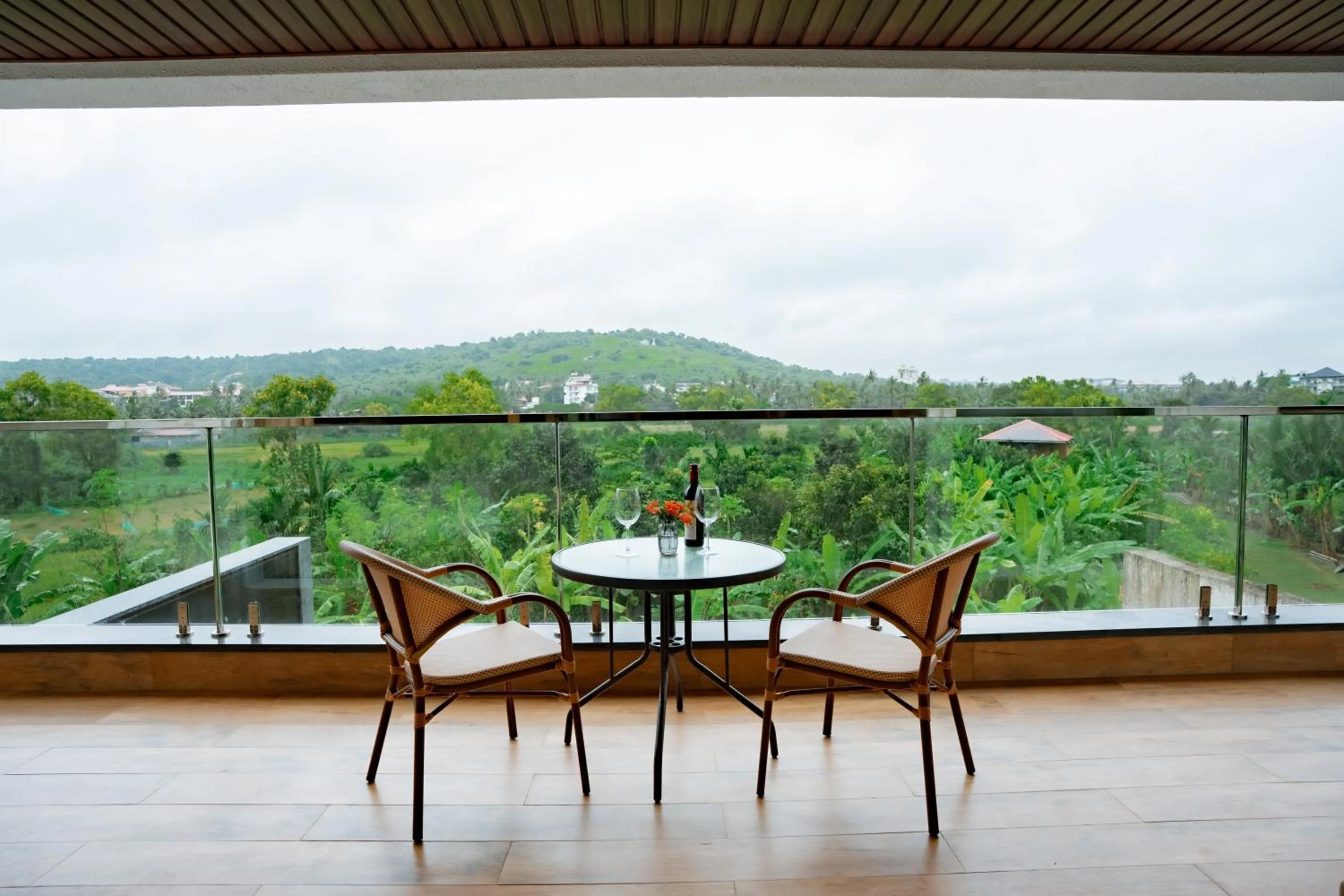 Balcony/Terrace in The Tanisi Resorts & Pool Villas, Candolim