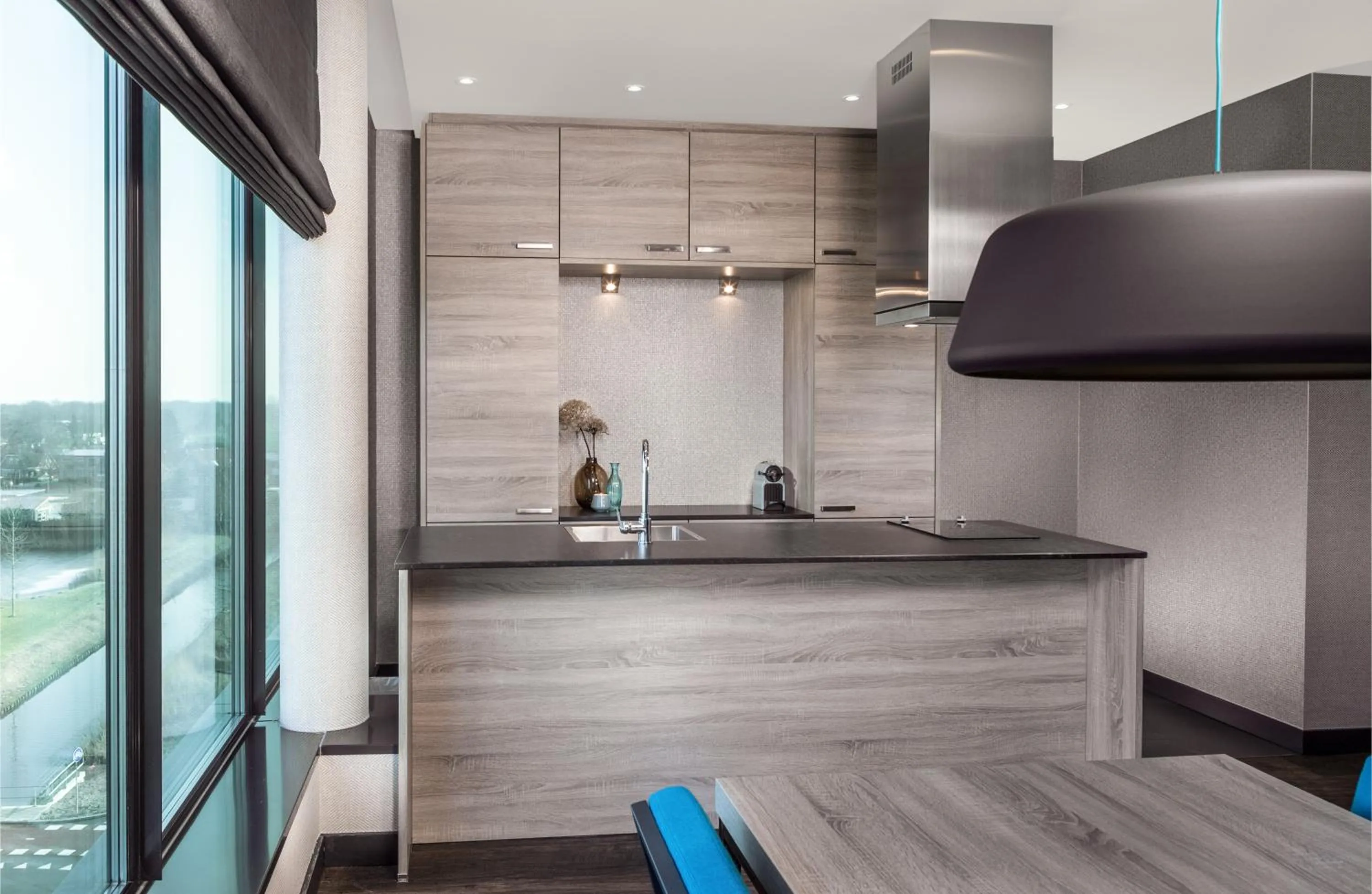 Kitchen or kitchenette in Van der Valk hotel Veenendaal