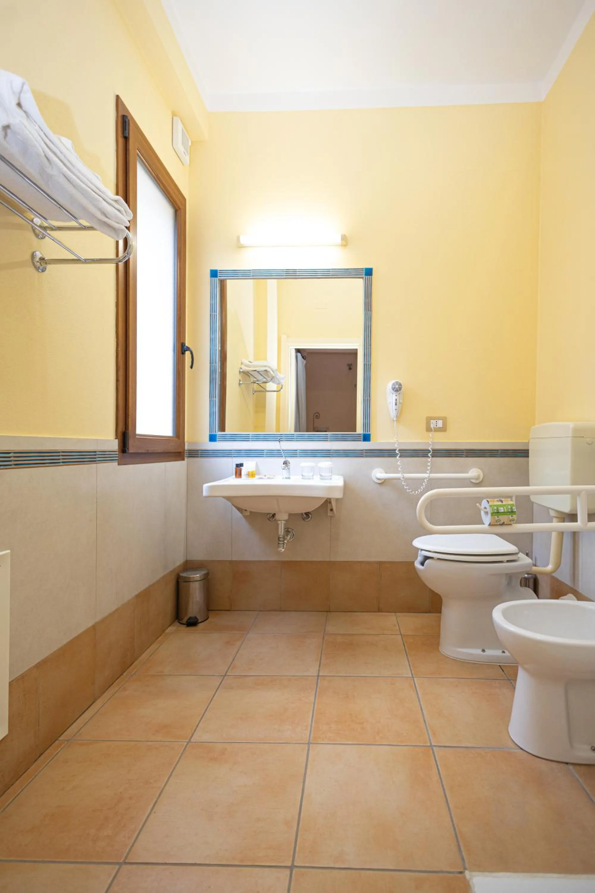 Toilet in LVG Hotel Collection - La Rosa dei Venti