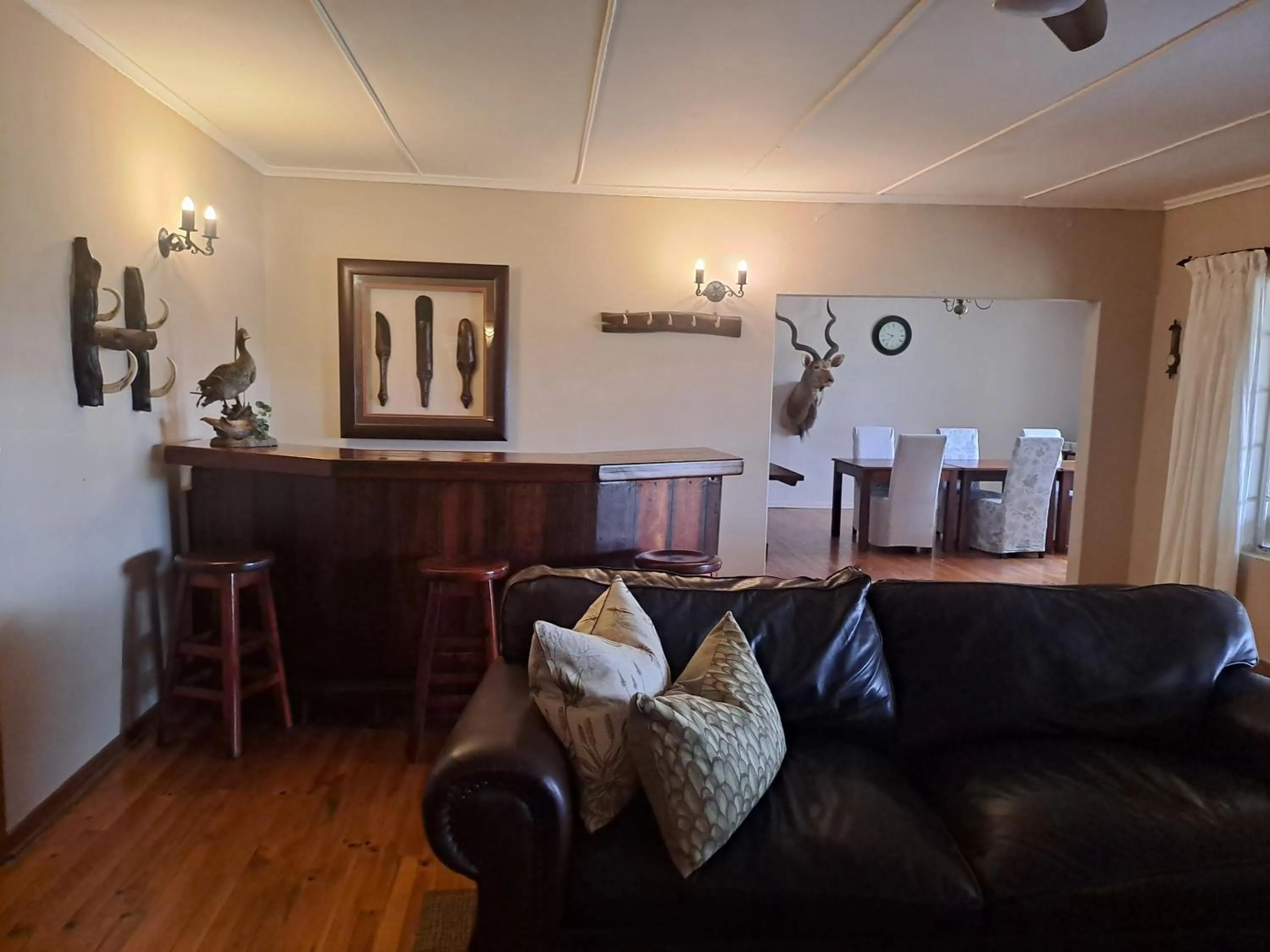 Lounge or bar in The Ranch House at African Safari Lodge