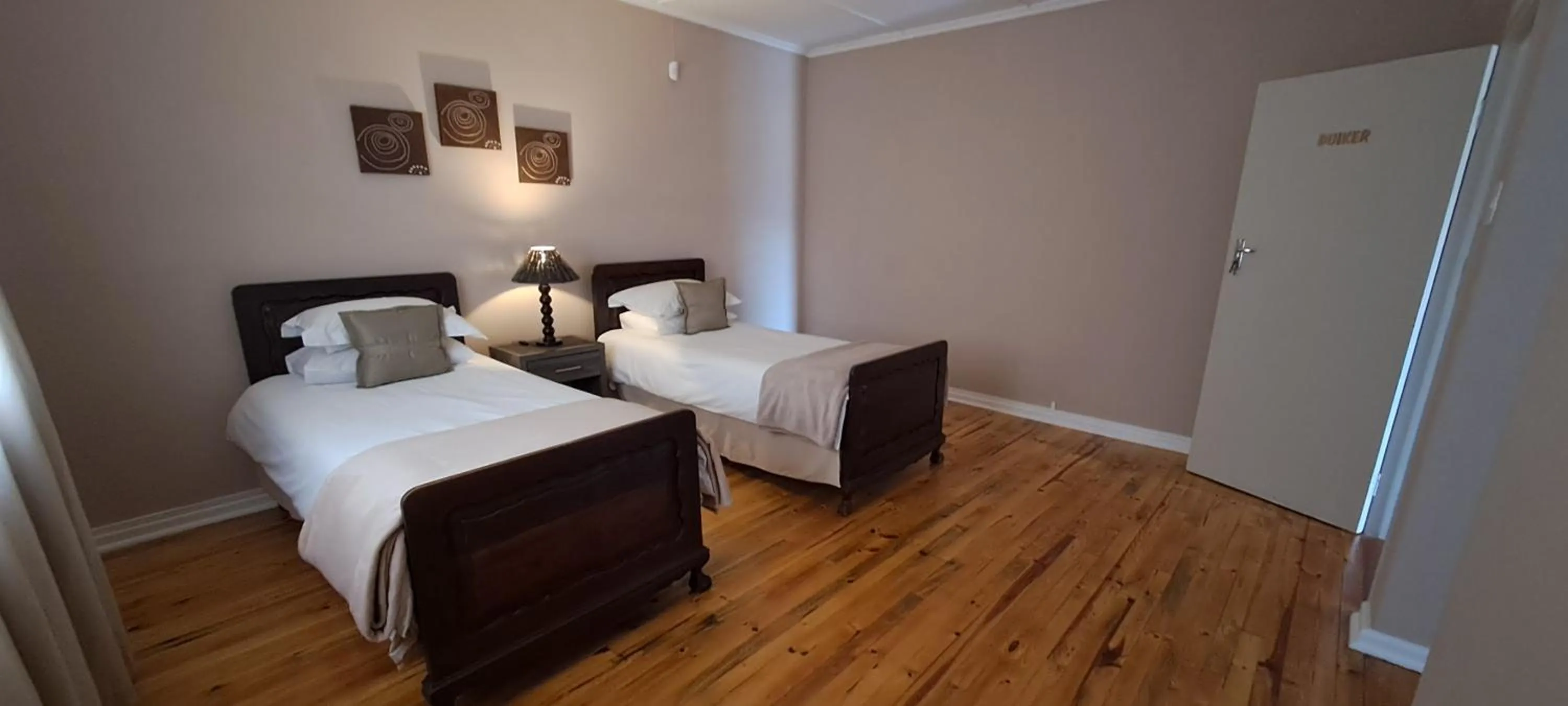 Bedroom, Bed in The Ranch House at African Safari Lodge