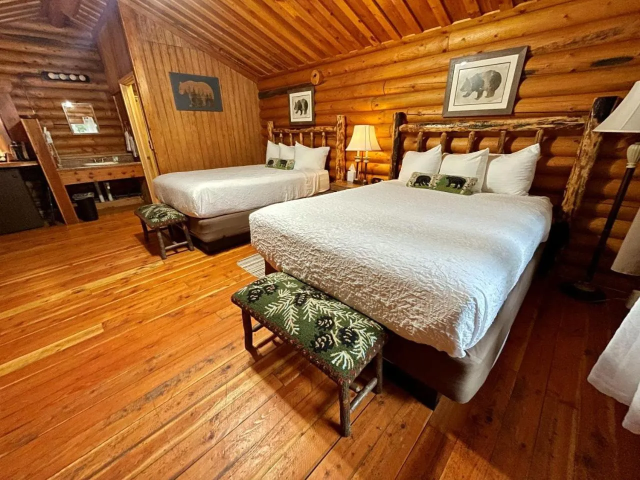 Bed in Riverfront Motel & Cabins