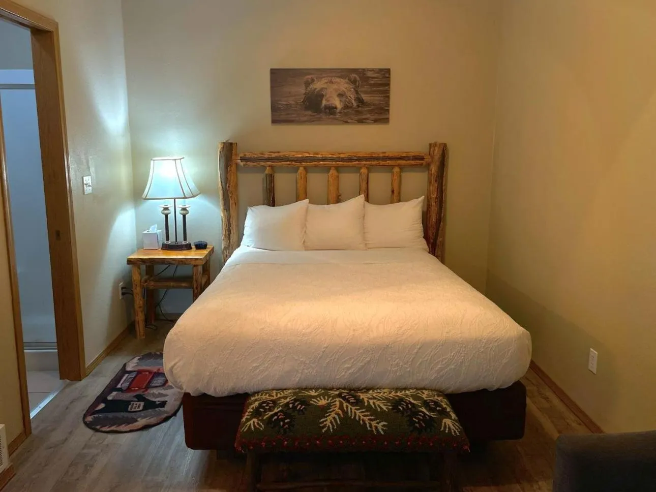 Bed in Riverfront Motel & Cabins