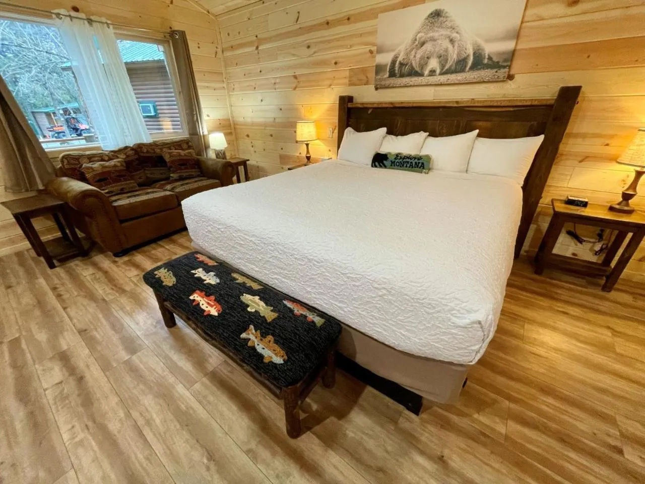 Bed in Riverfront Motel & Cabins