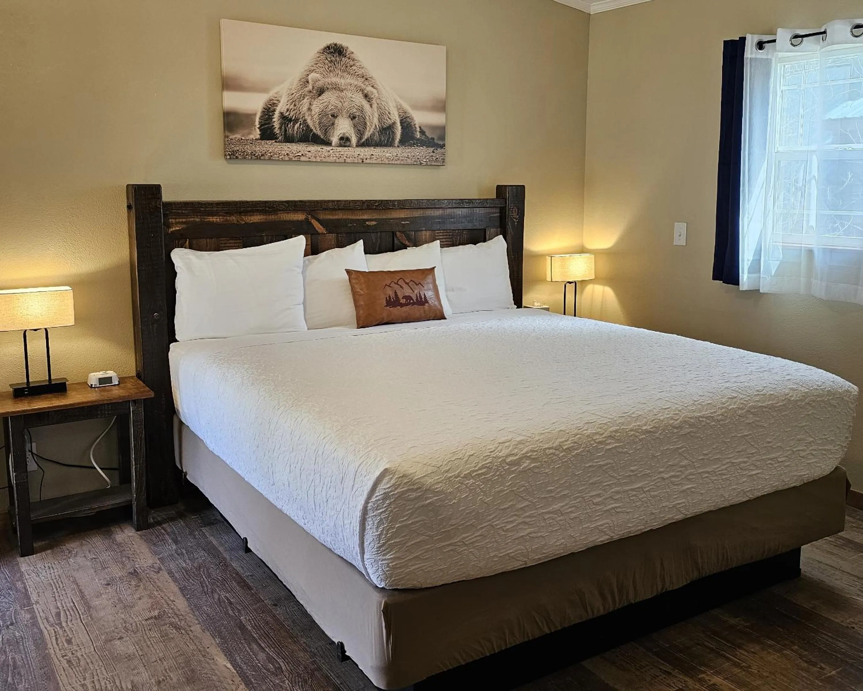 Bed in Riverfront Motel & Cabins