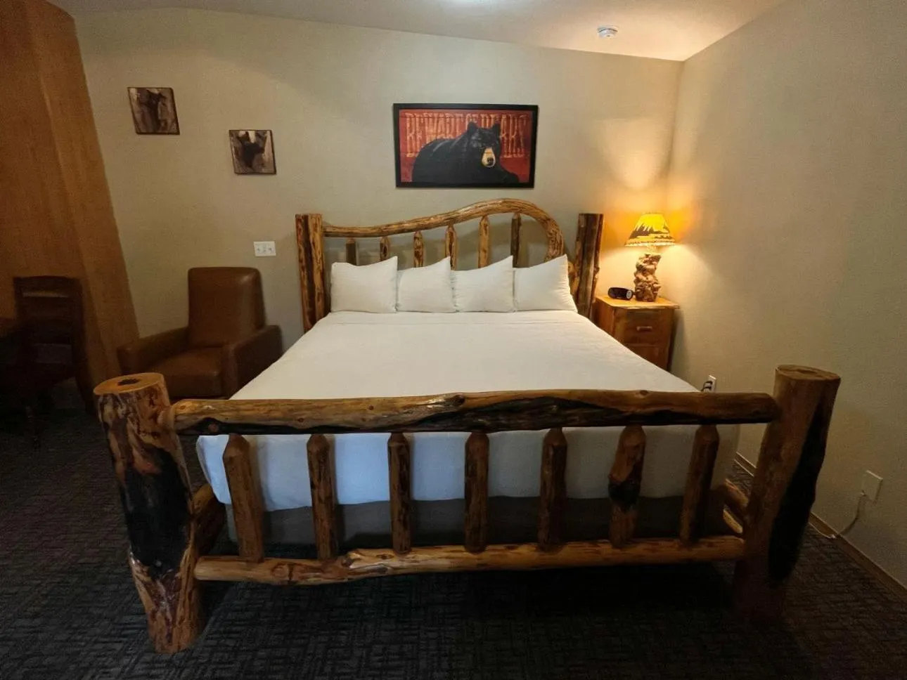 Bed in Riverfront Motel & Cabins