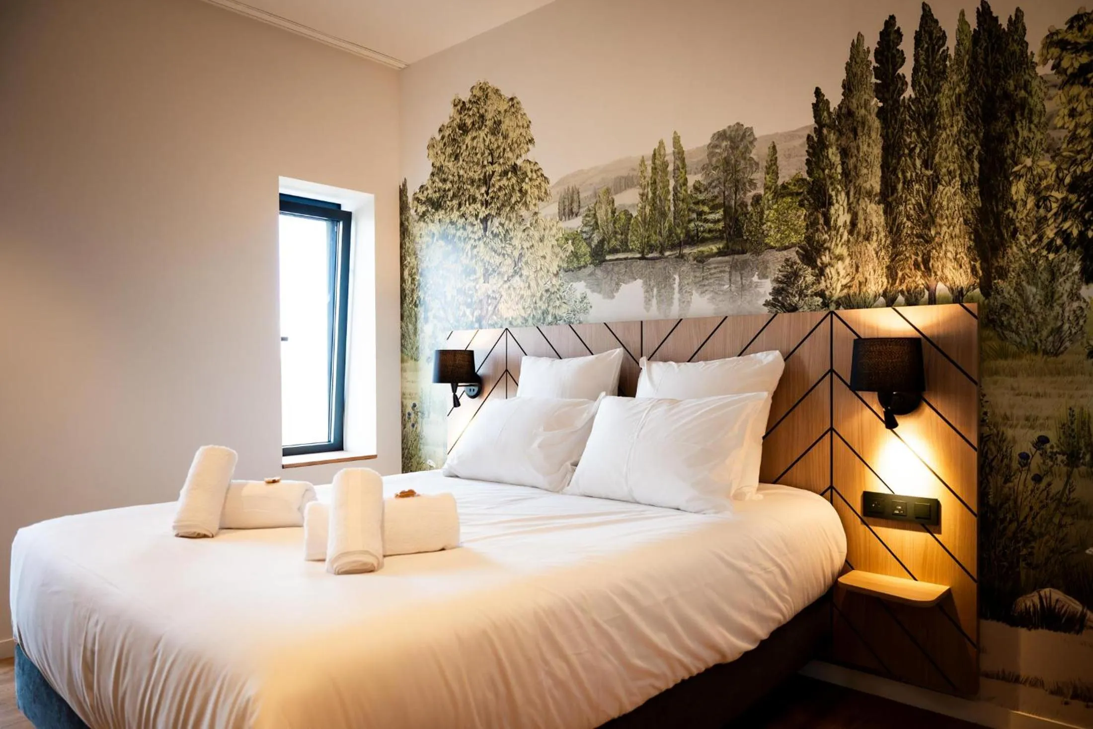 Bed in Bô Hôtels Ambronay