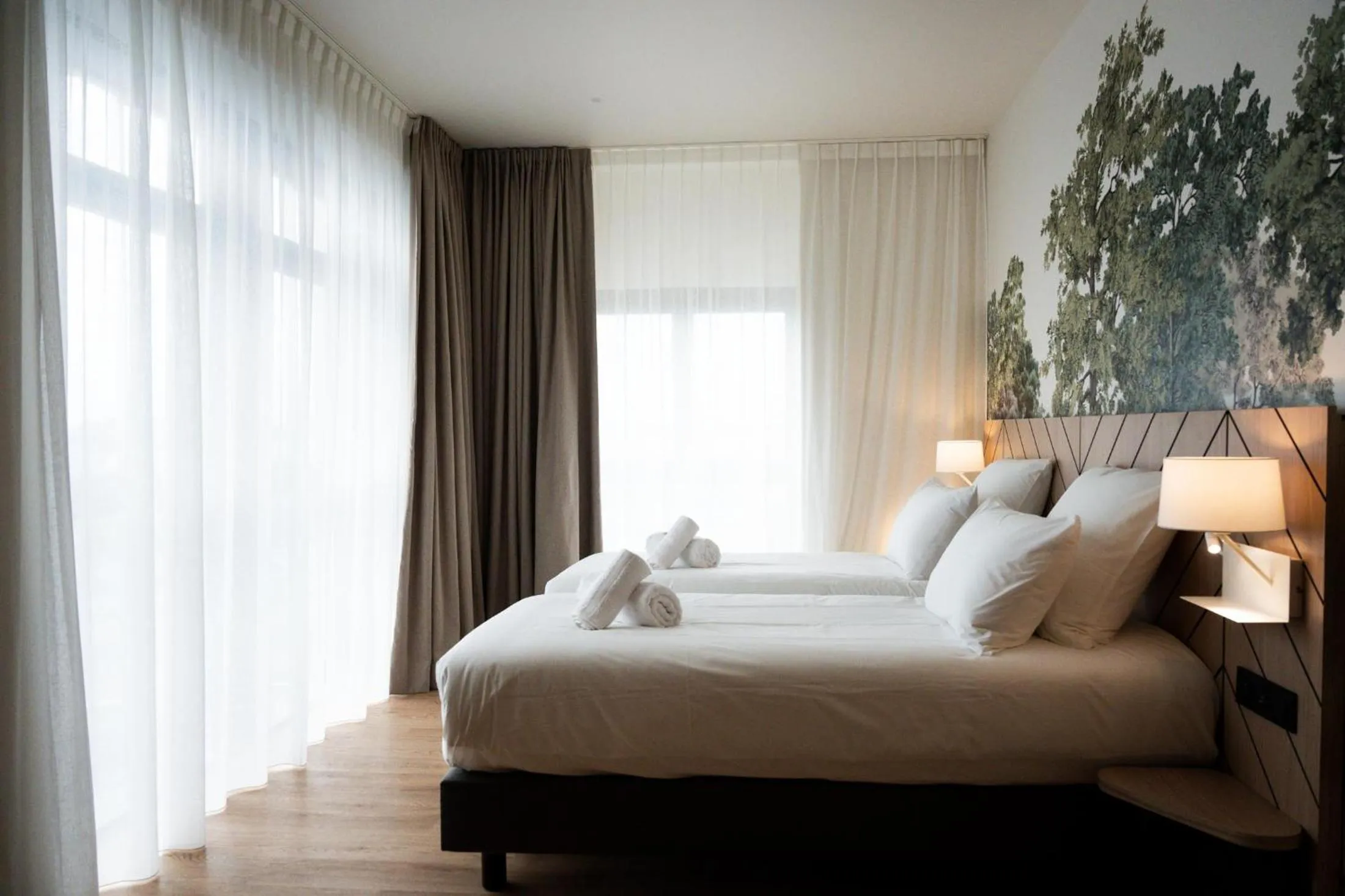 Bed in Bô Hôtels Ambronay