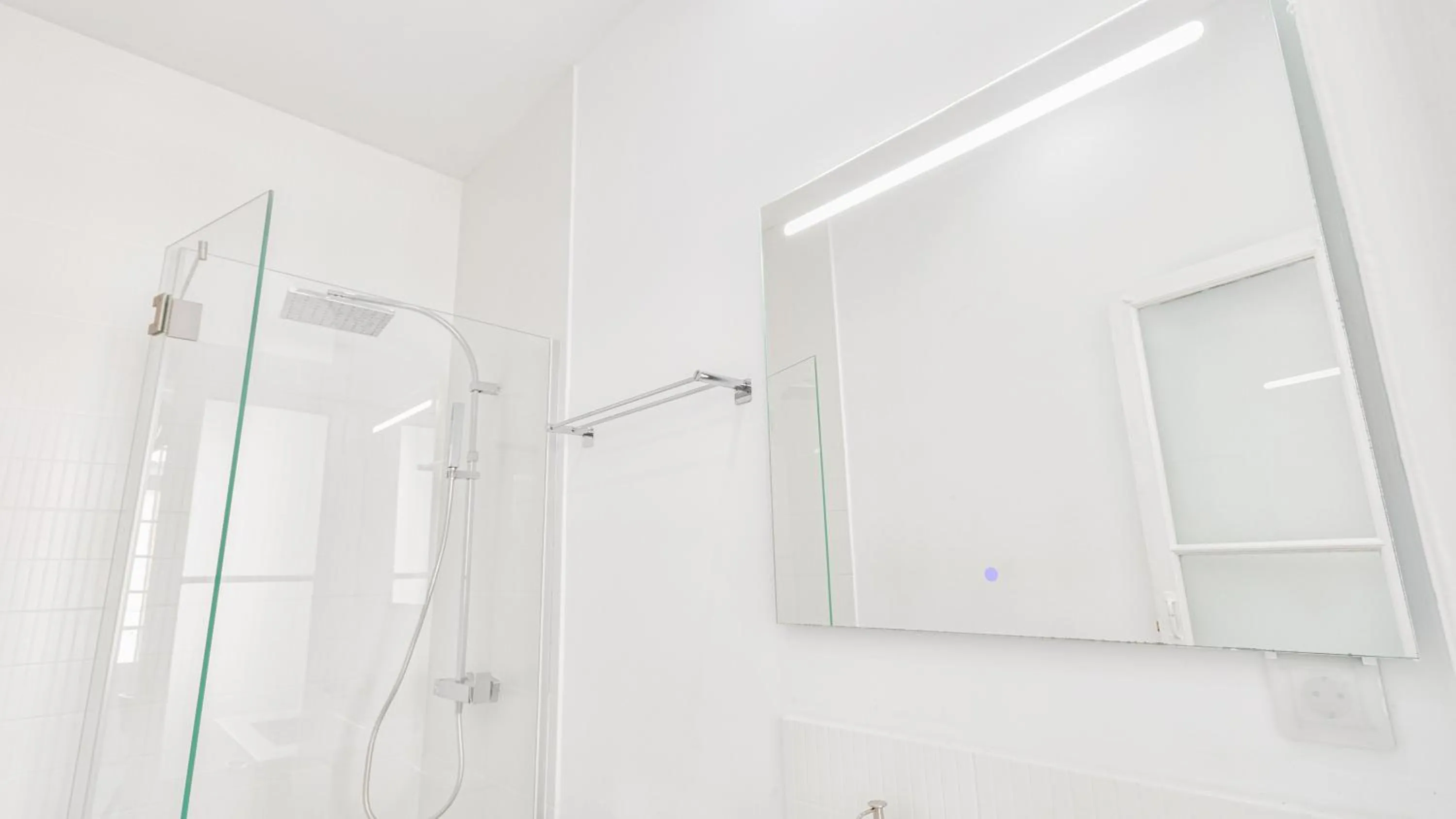 Bathroom in Sintra Retreat Residences by LovelyStay