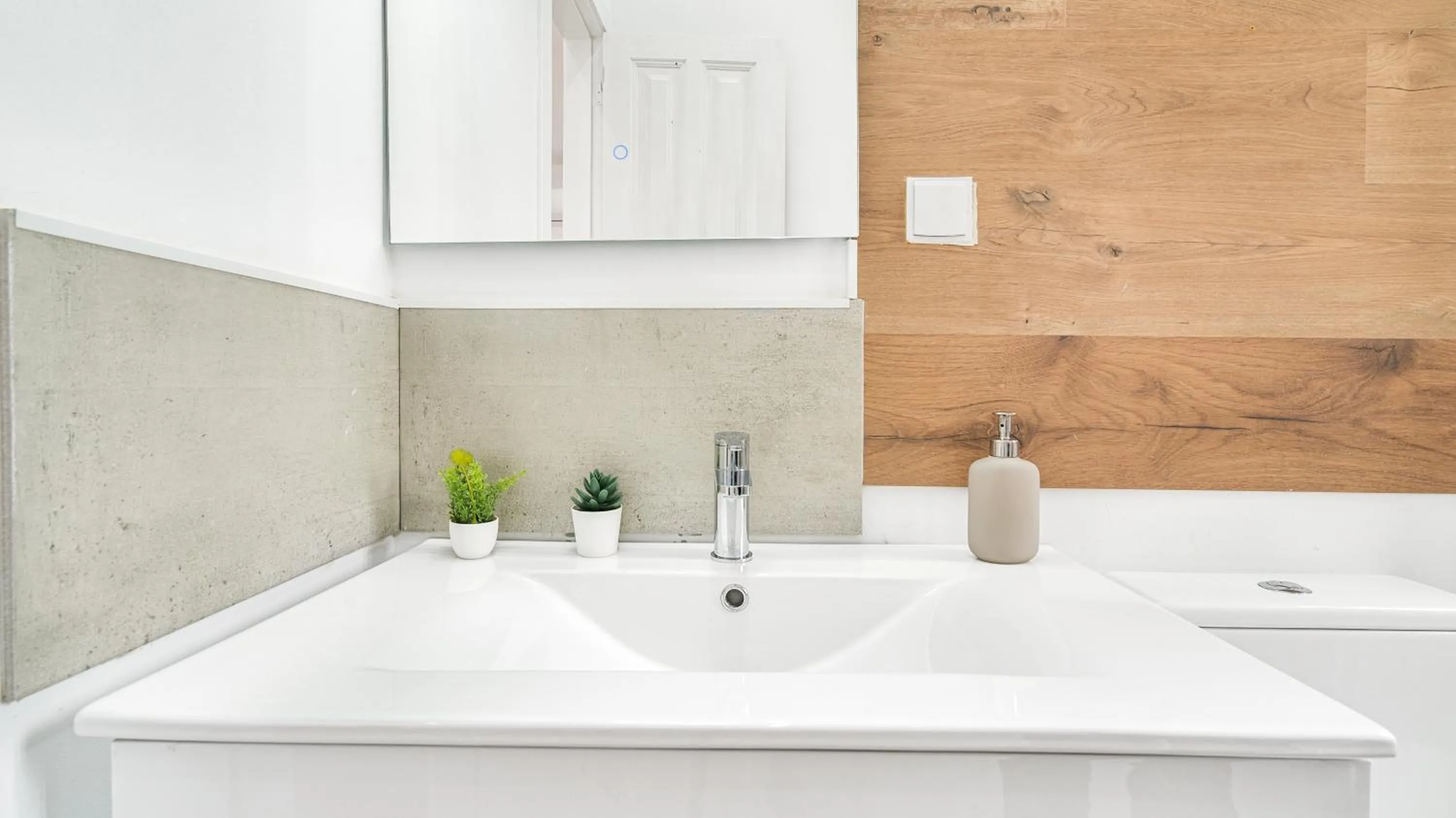 Bathroom in Sintra Retreat Residences by LovelyStay