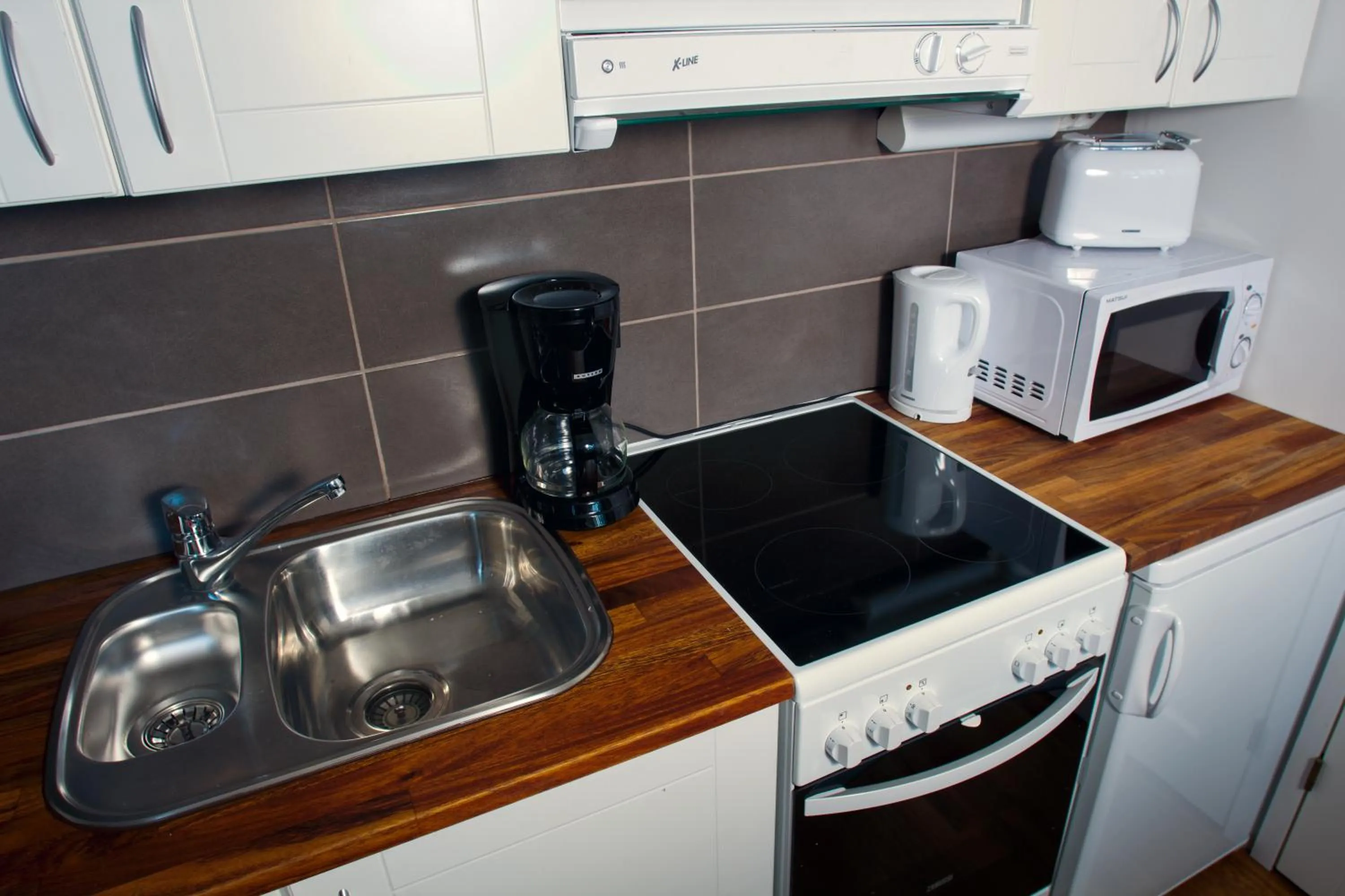 Kitchen or kitchenette in Salpalinjan Hovi