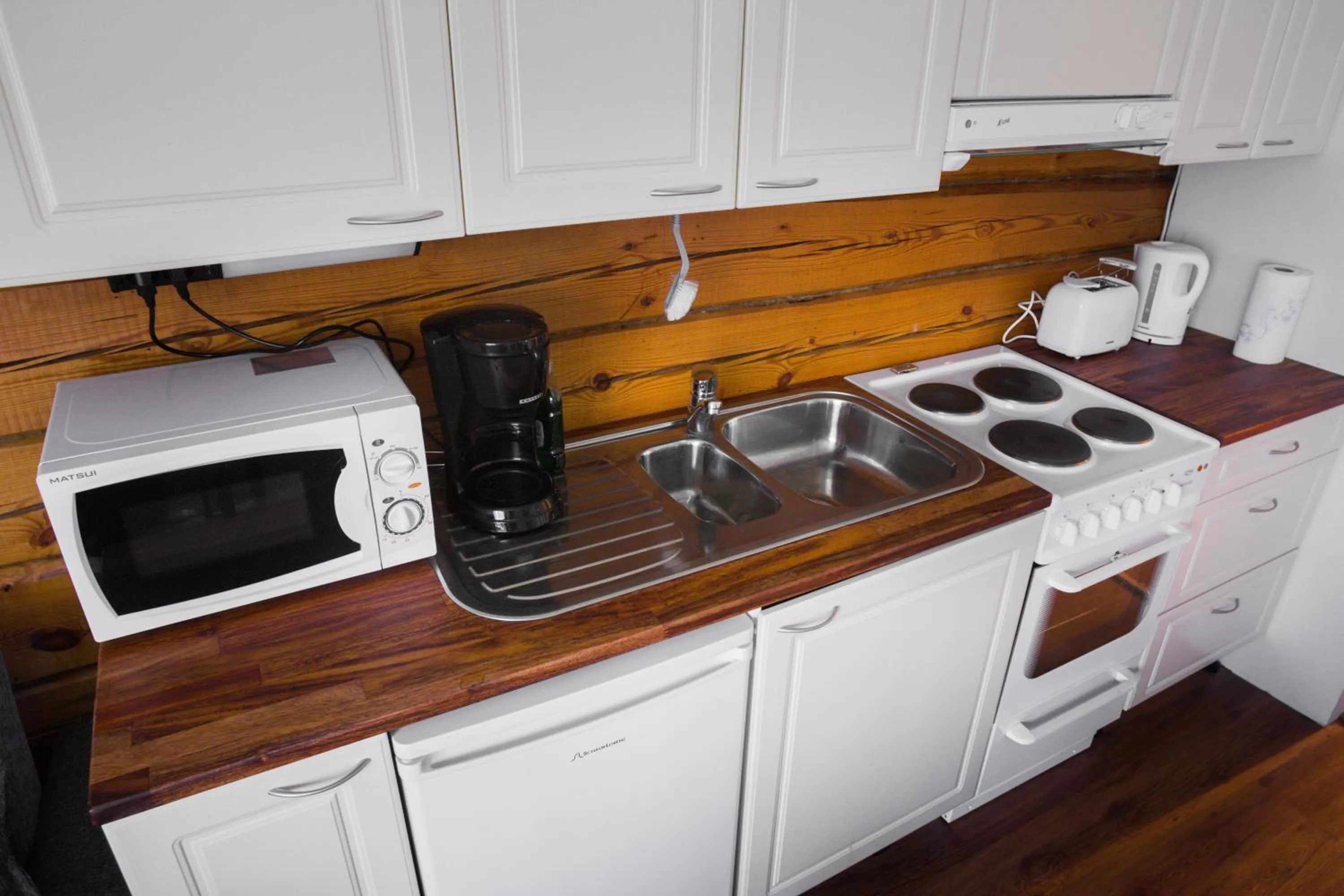 Kitchen or kitchenette in Salpalinjan Hovi