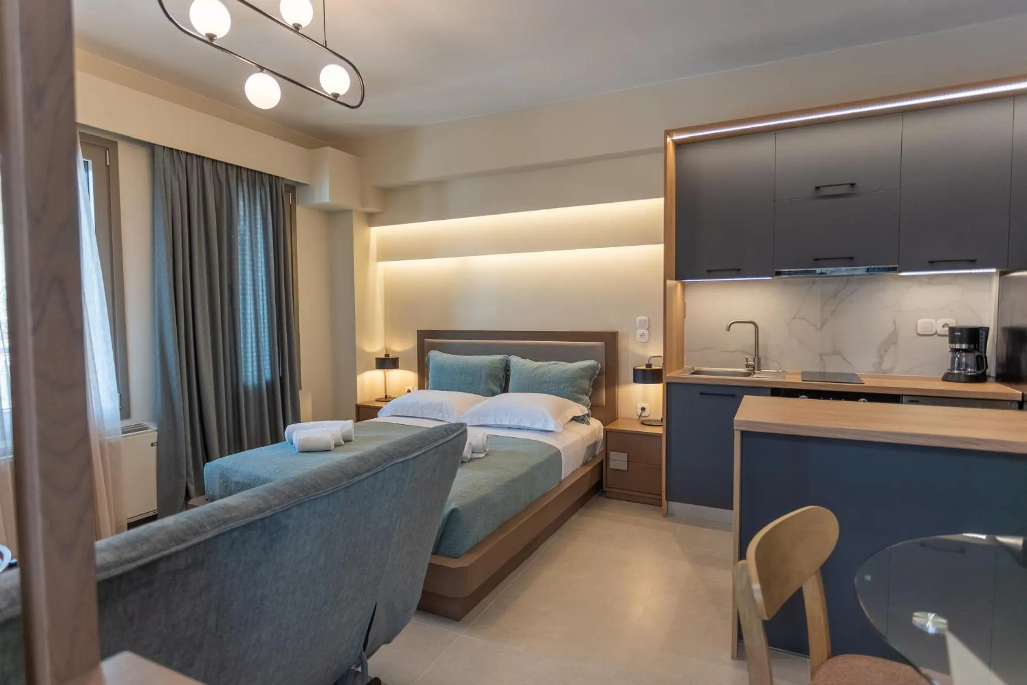 Kitchen or kitchenette, Bed in Akti Vigla Apartments