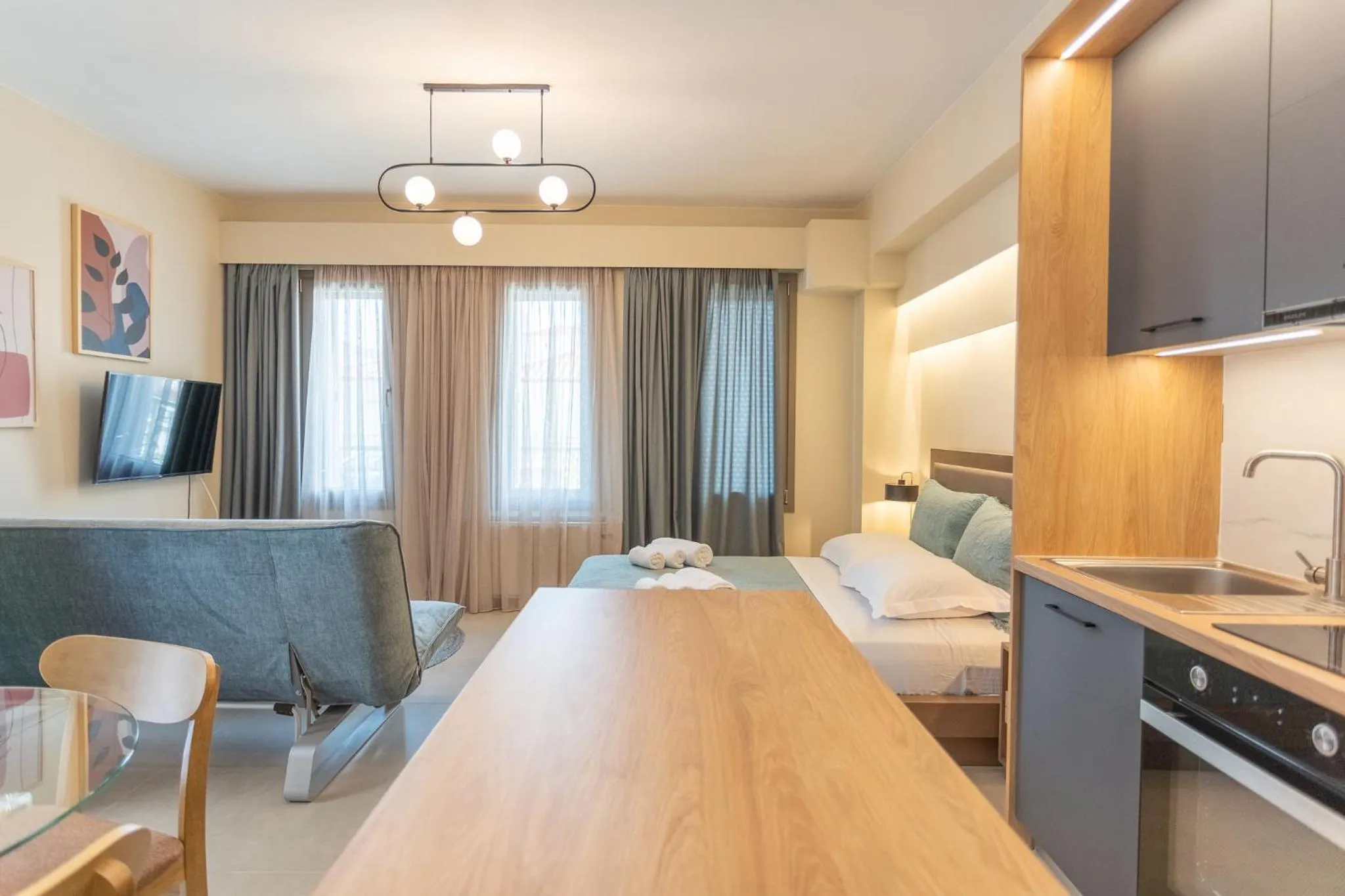 Kitchen or kitchenette, Bed in Akti Vigla Apartments