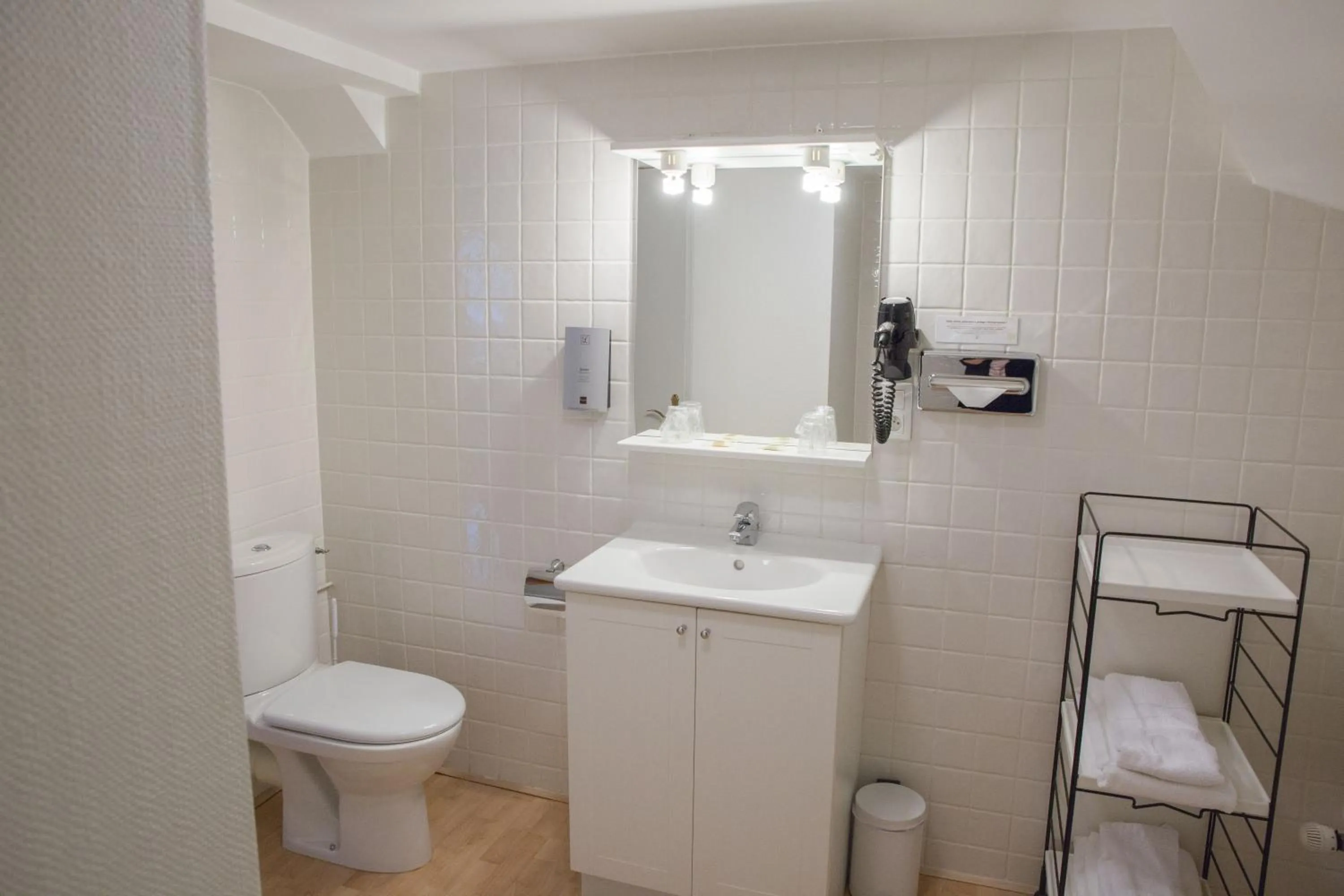 Bathroom in Appart Hotel Charles Sander