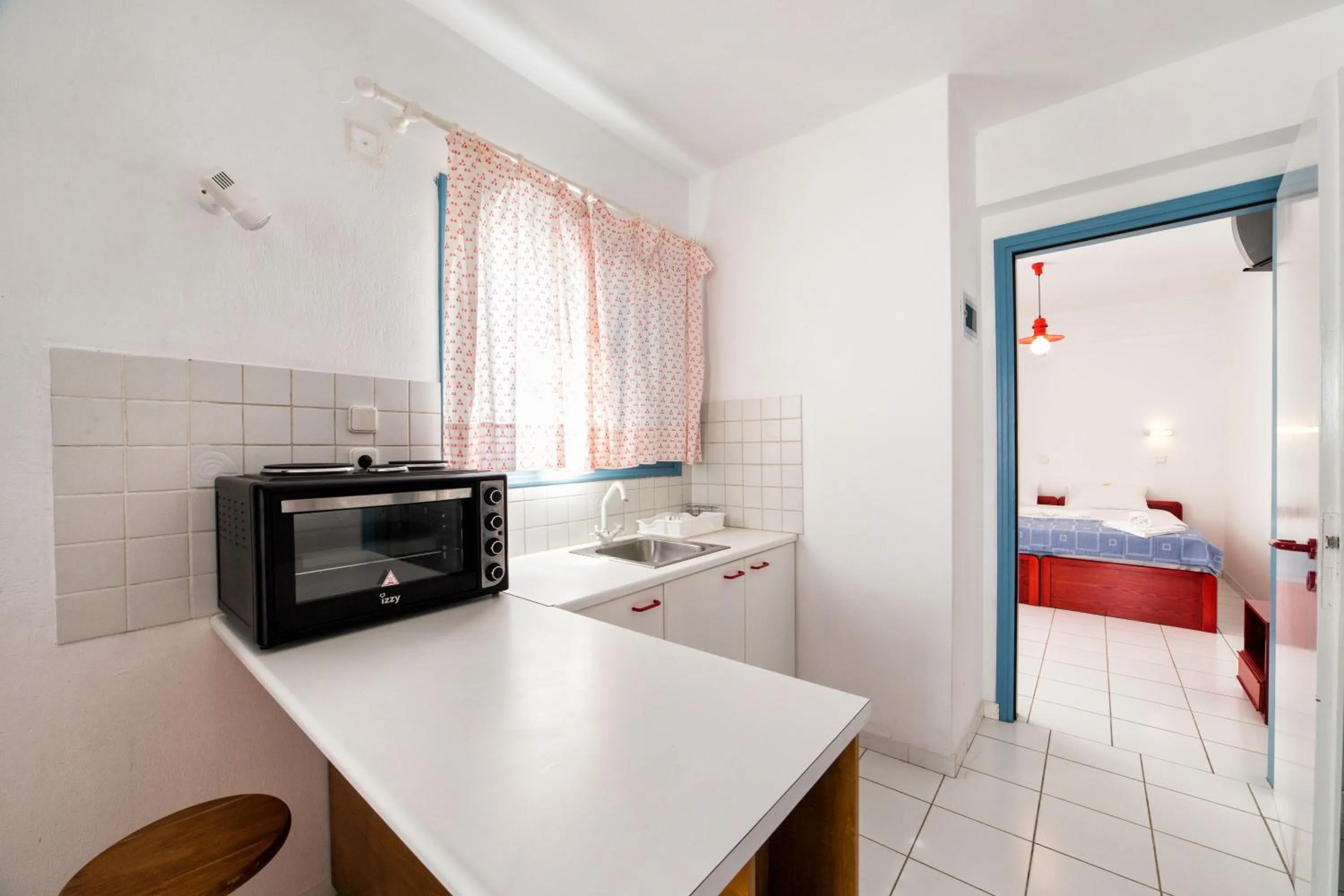Kitchen or kitchenette, Bed in Fivos Apartments