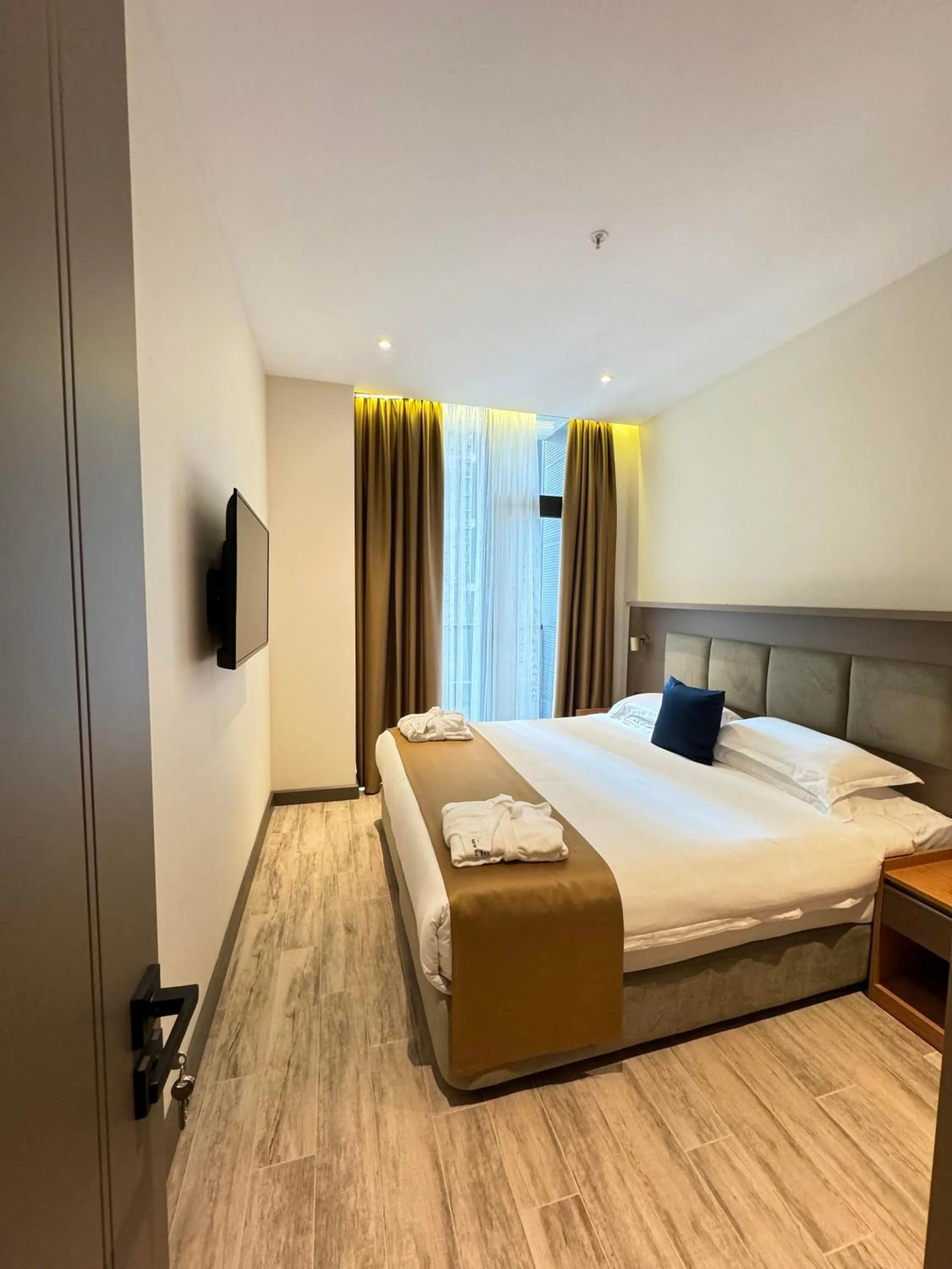 City view, Bed in New Wave Apart-Hotel