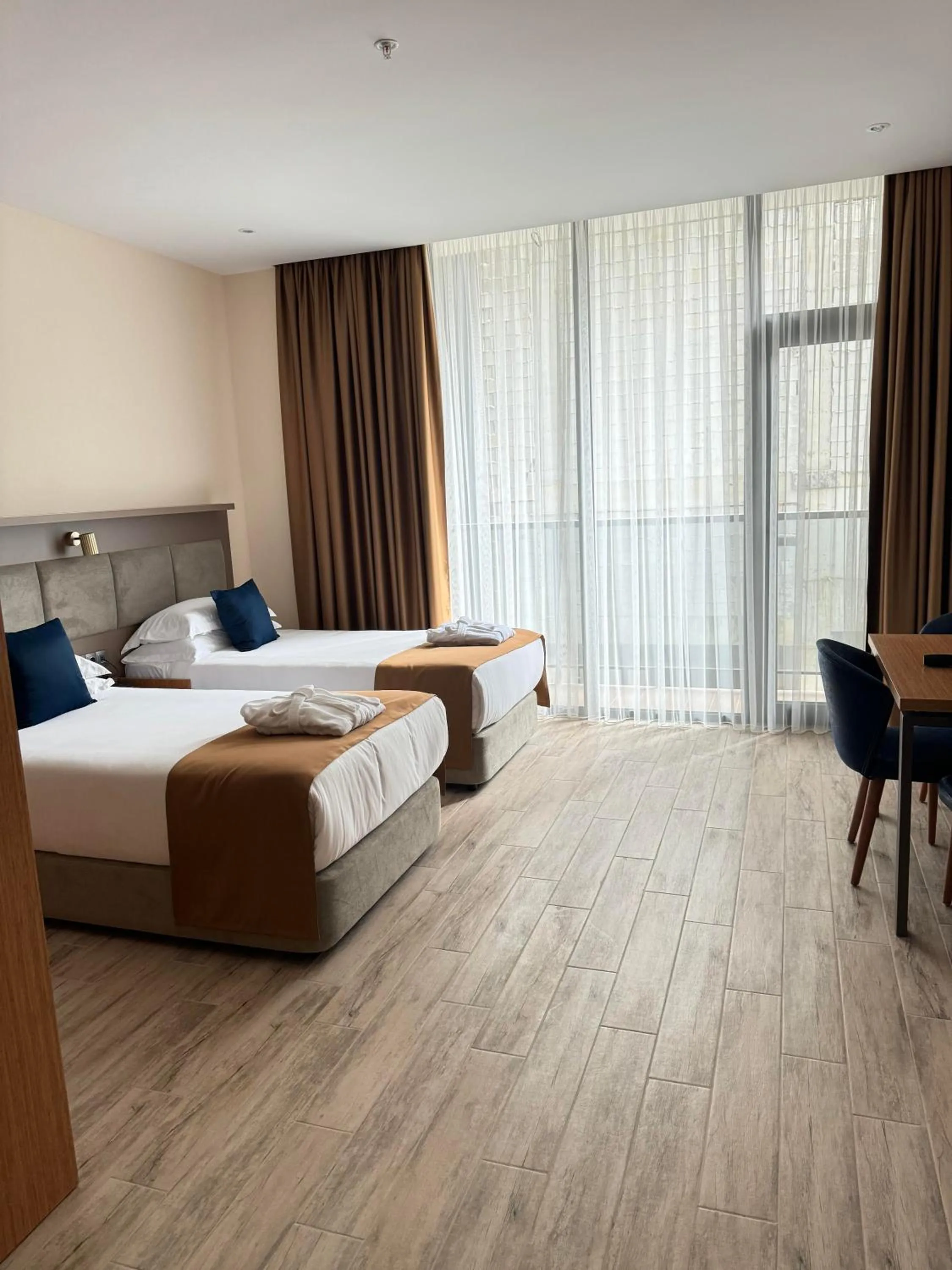 City view, Bed in New Wave Apart-Hotel