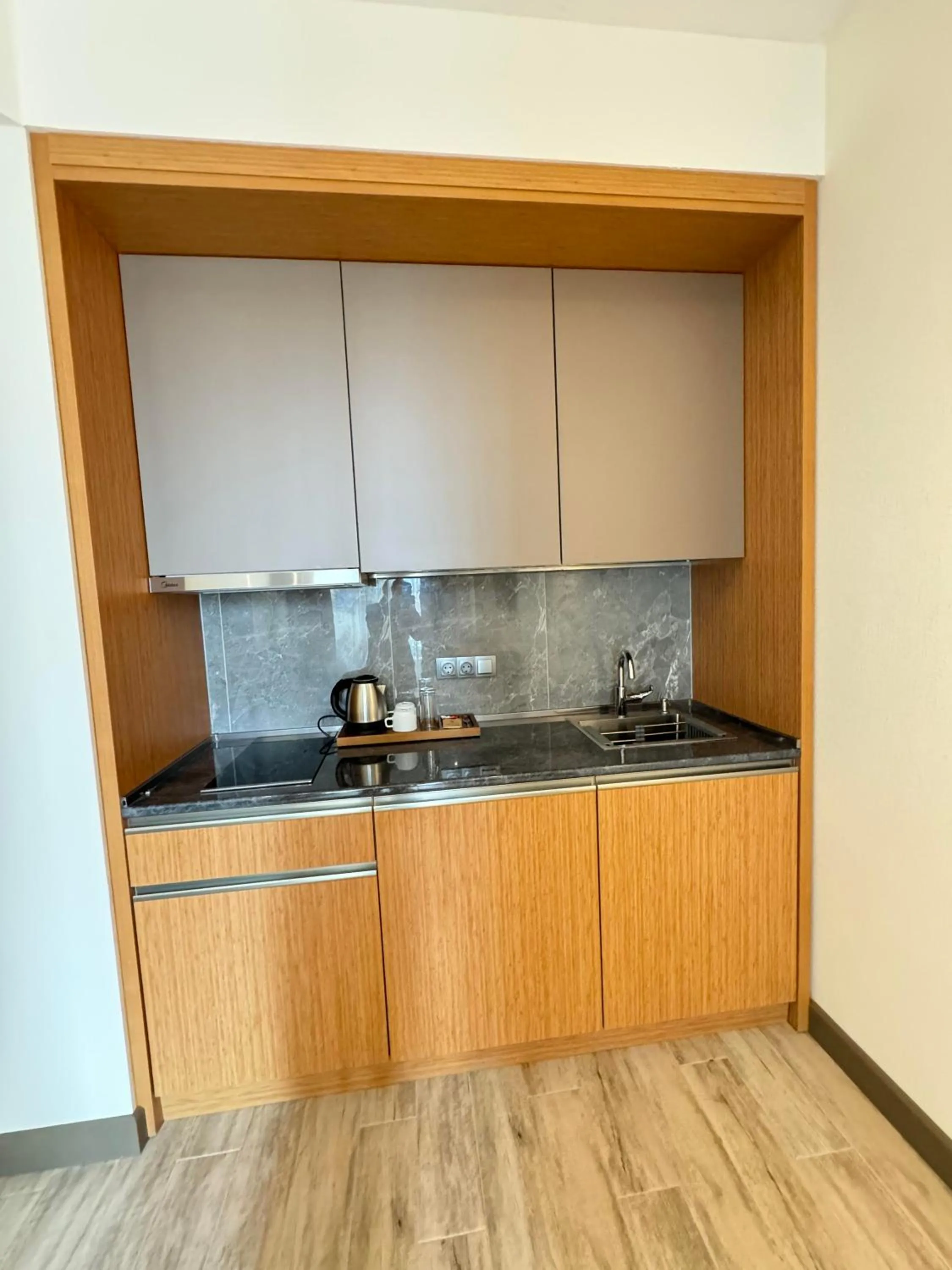 kitchen in New Wave Apart-Hotel