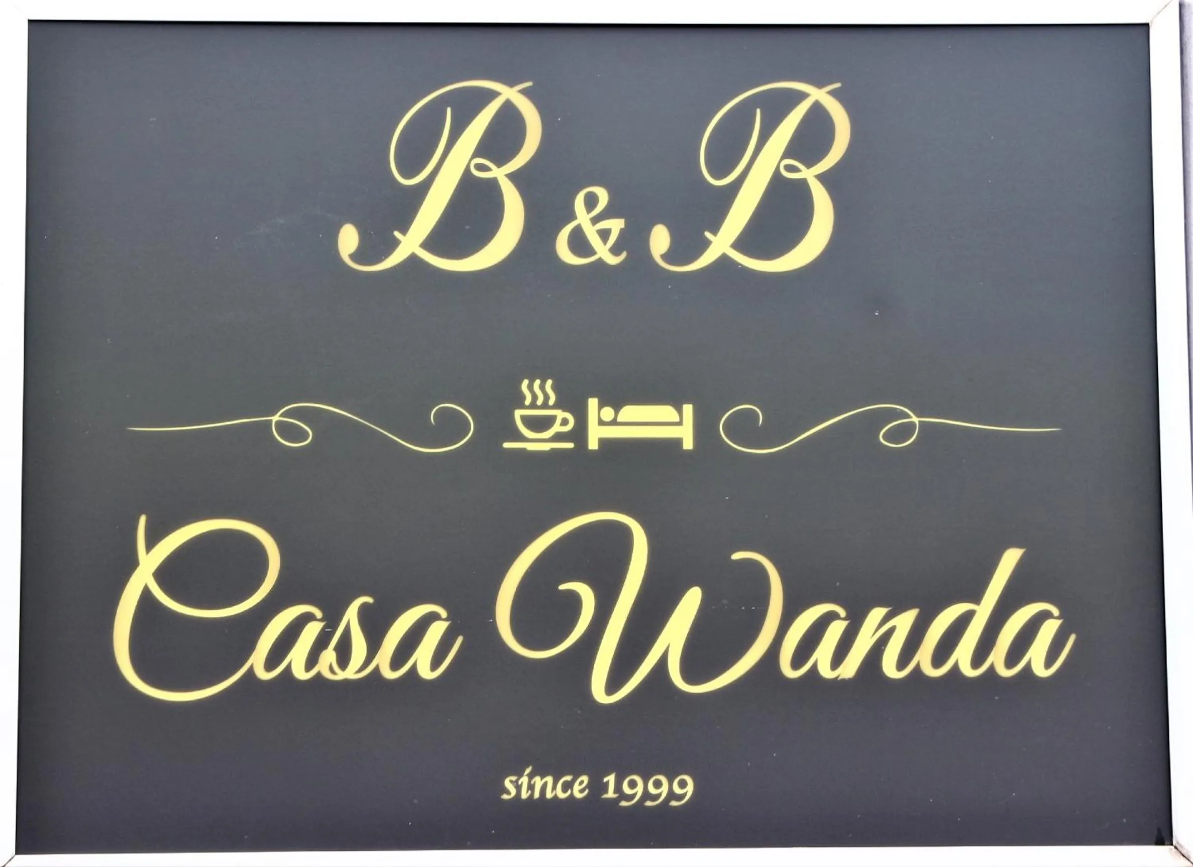 Property logo or sign in B&B Casa Wanda since 1999