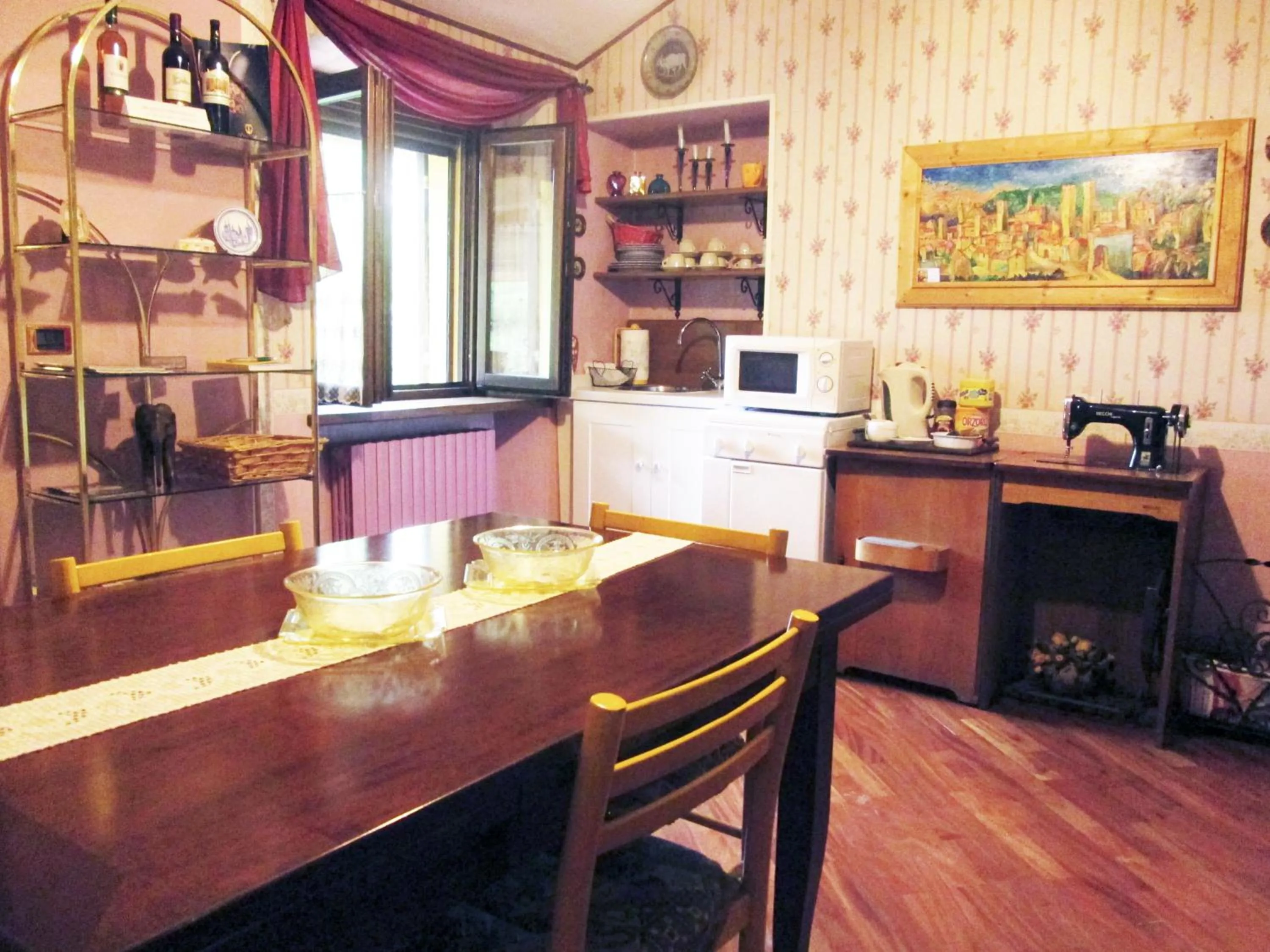 Communal lounge/ TV room in B&B Piceno