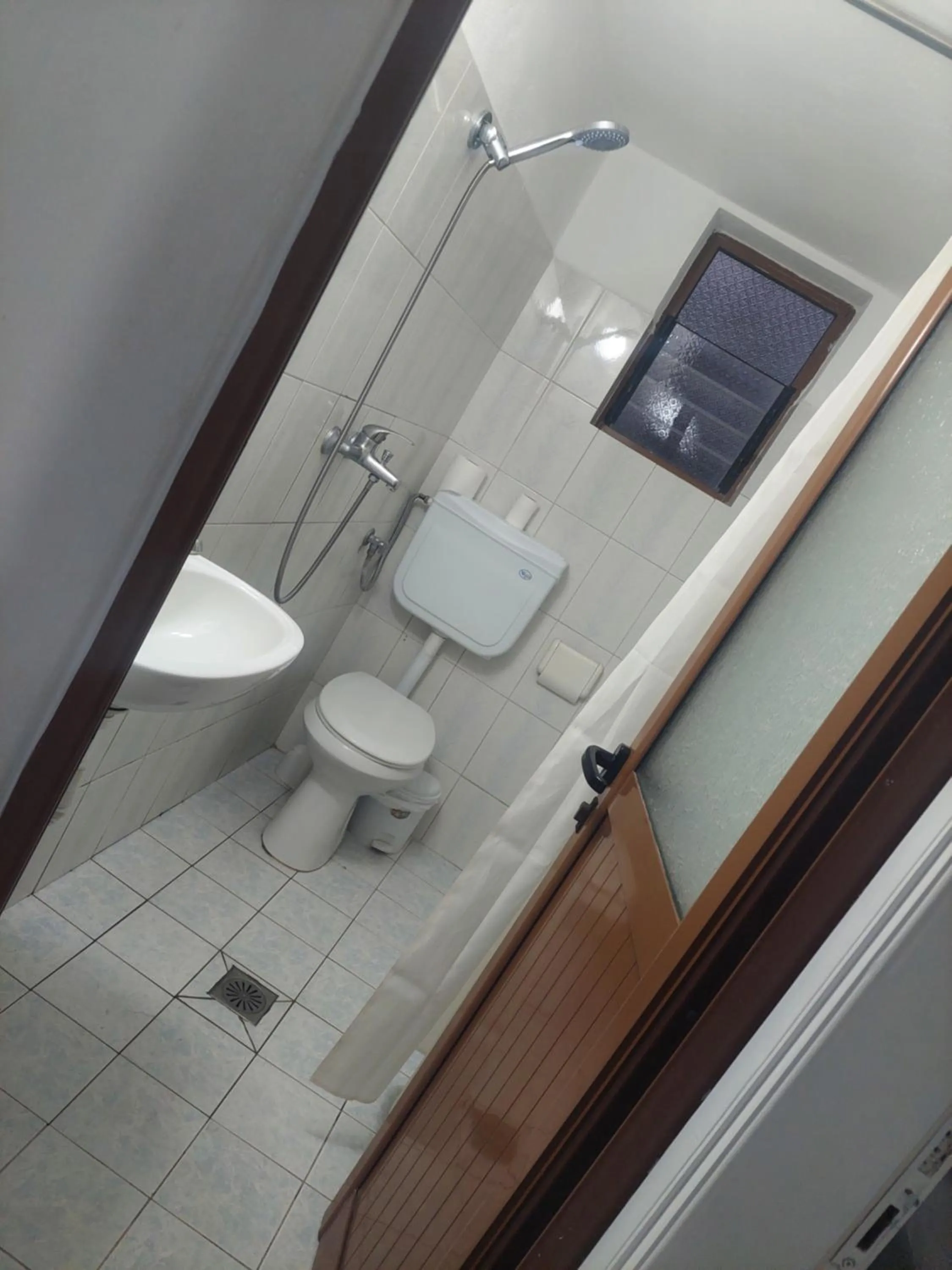 Toilet in Casa Mia Economy Condos