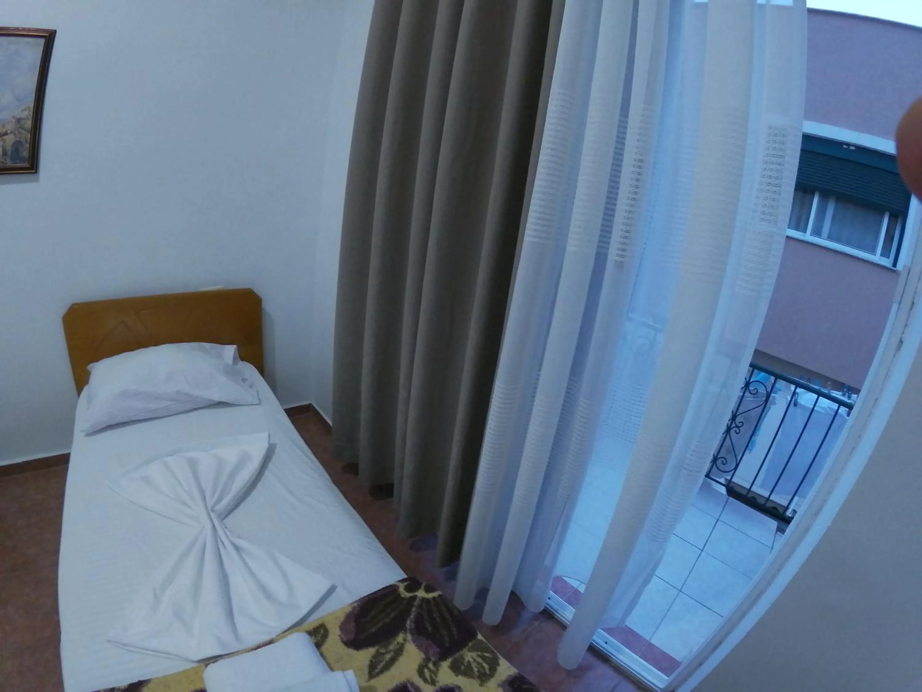 Bed in Casa Mia Economy Condos