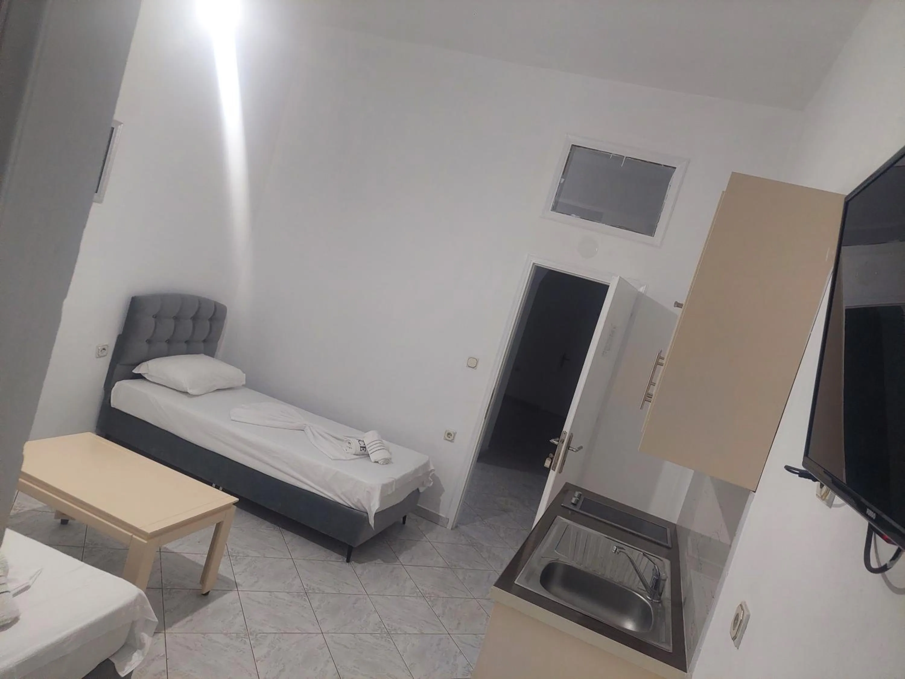 TV and multimedia, Bed in Casa Mia Economy Condos