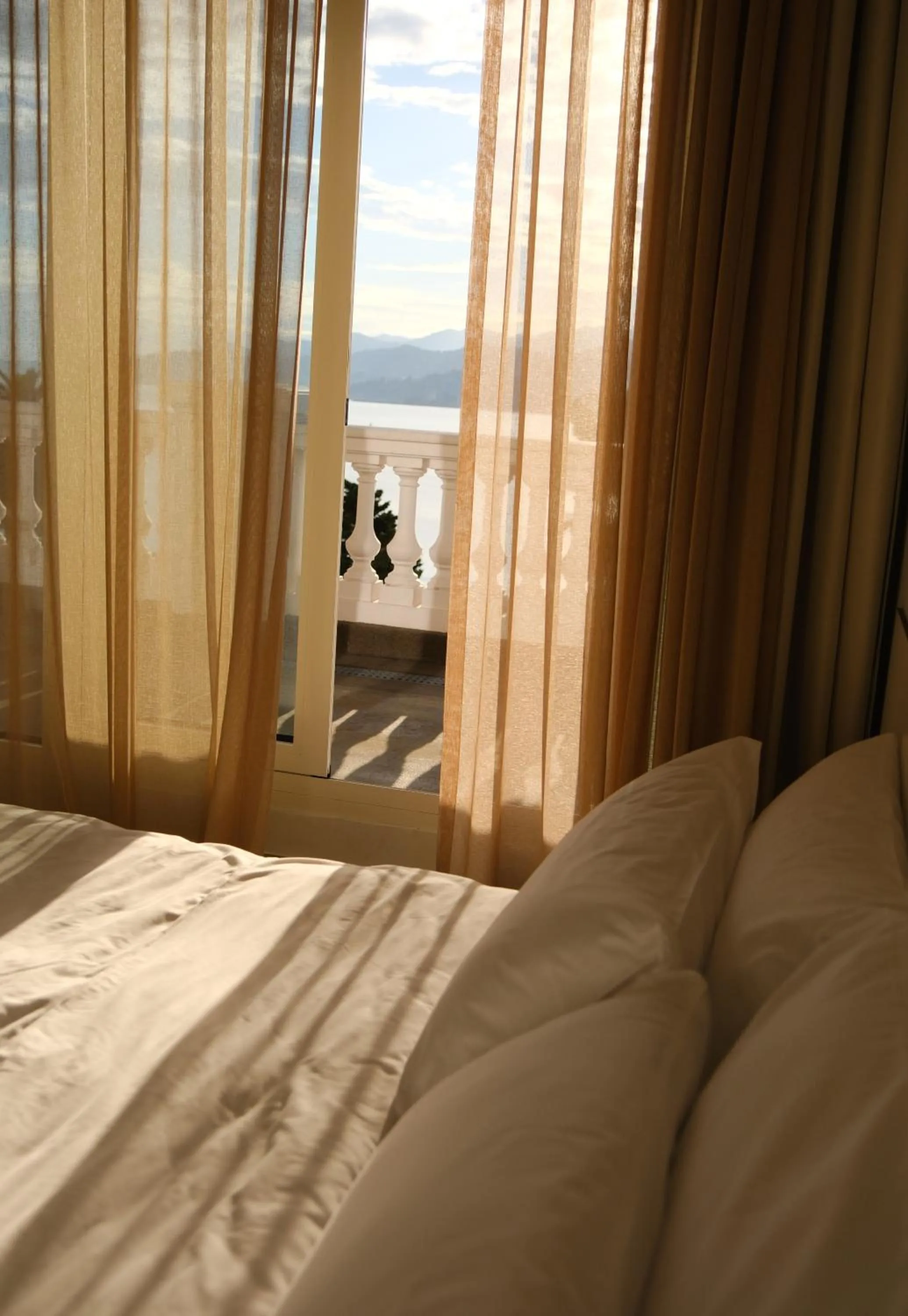 Bed in Le Port Boutique Apart Hotel