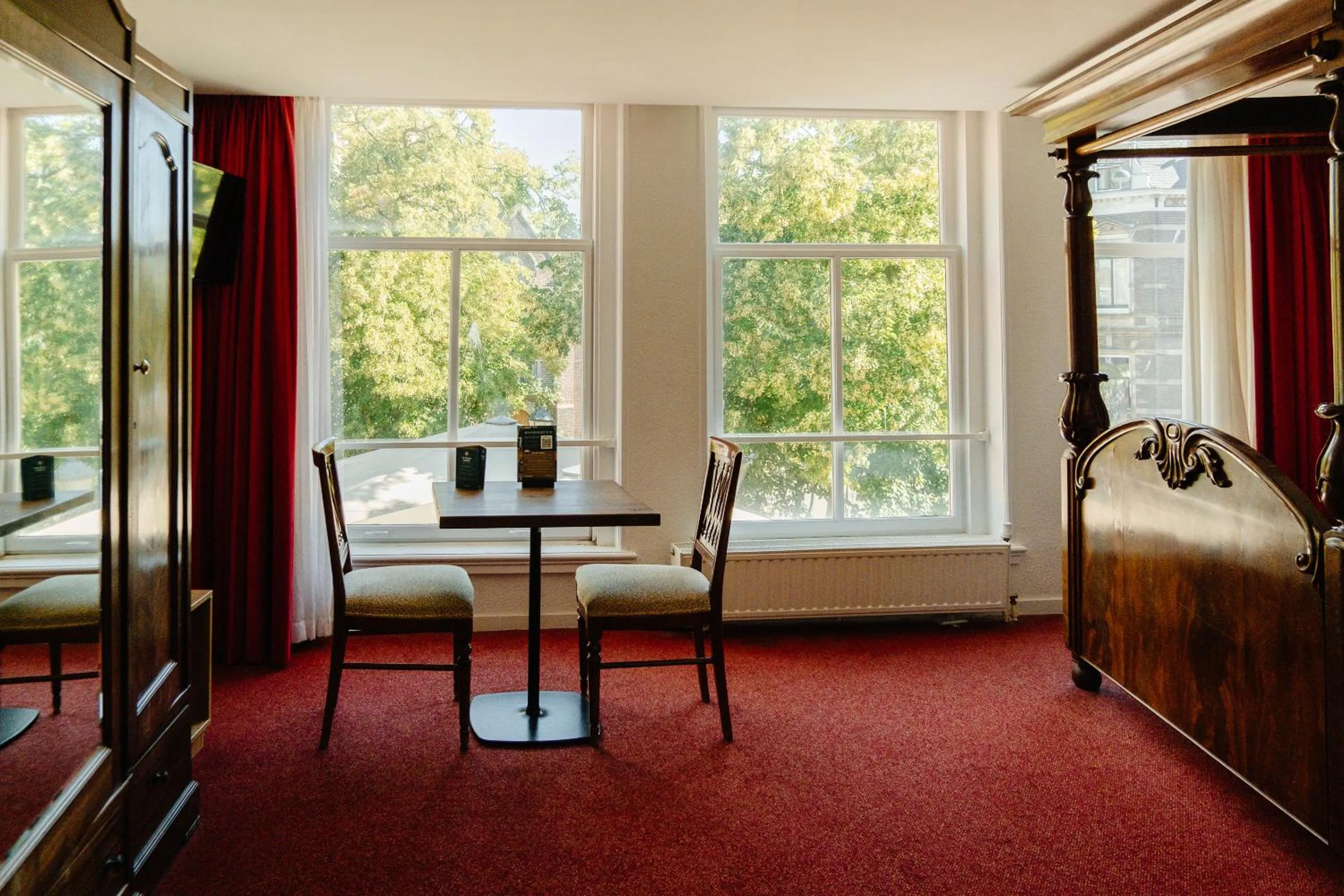 Bed in Ambassador City Centre Hotel