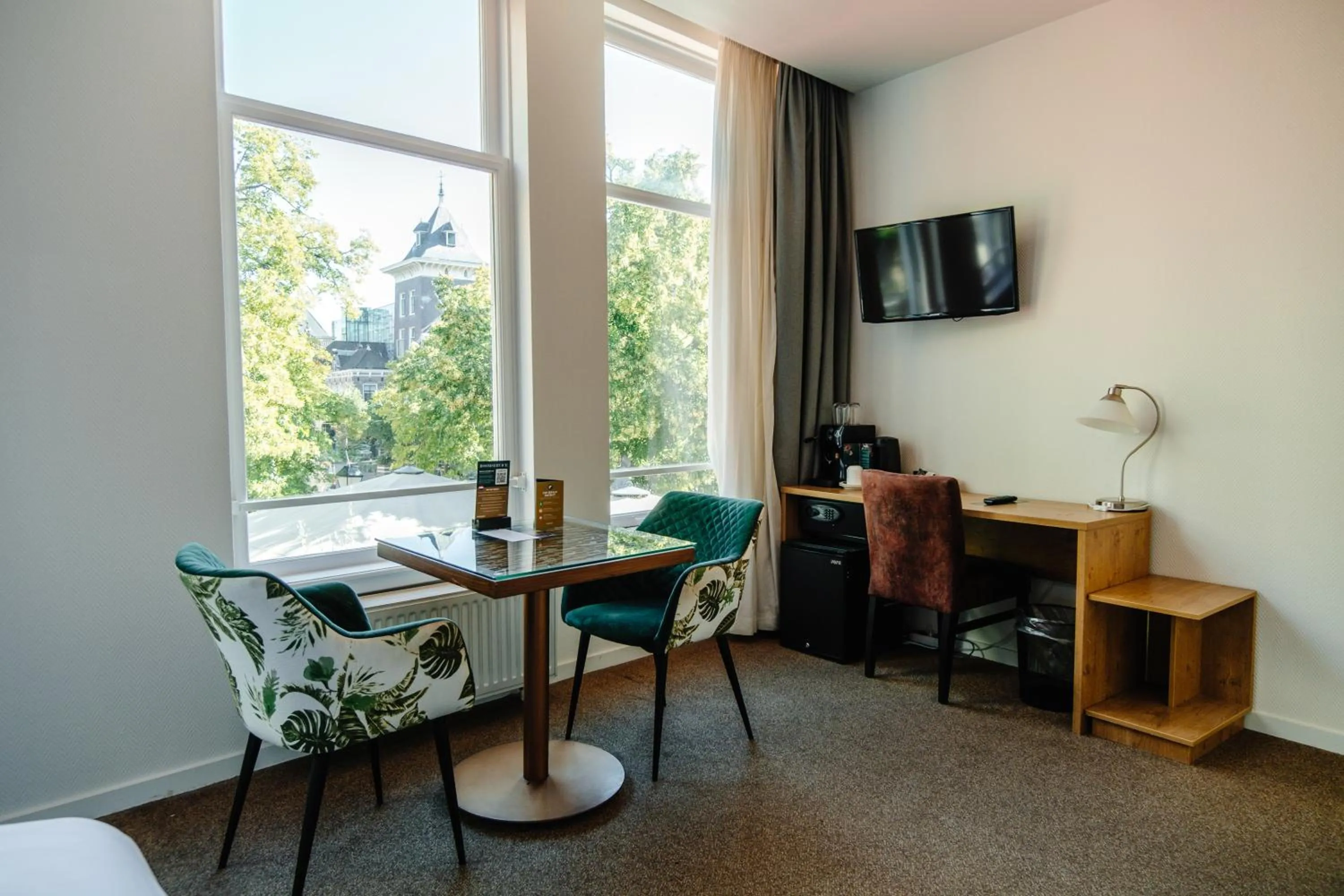 Bed in Ambassador City Centre Hotel