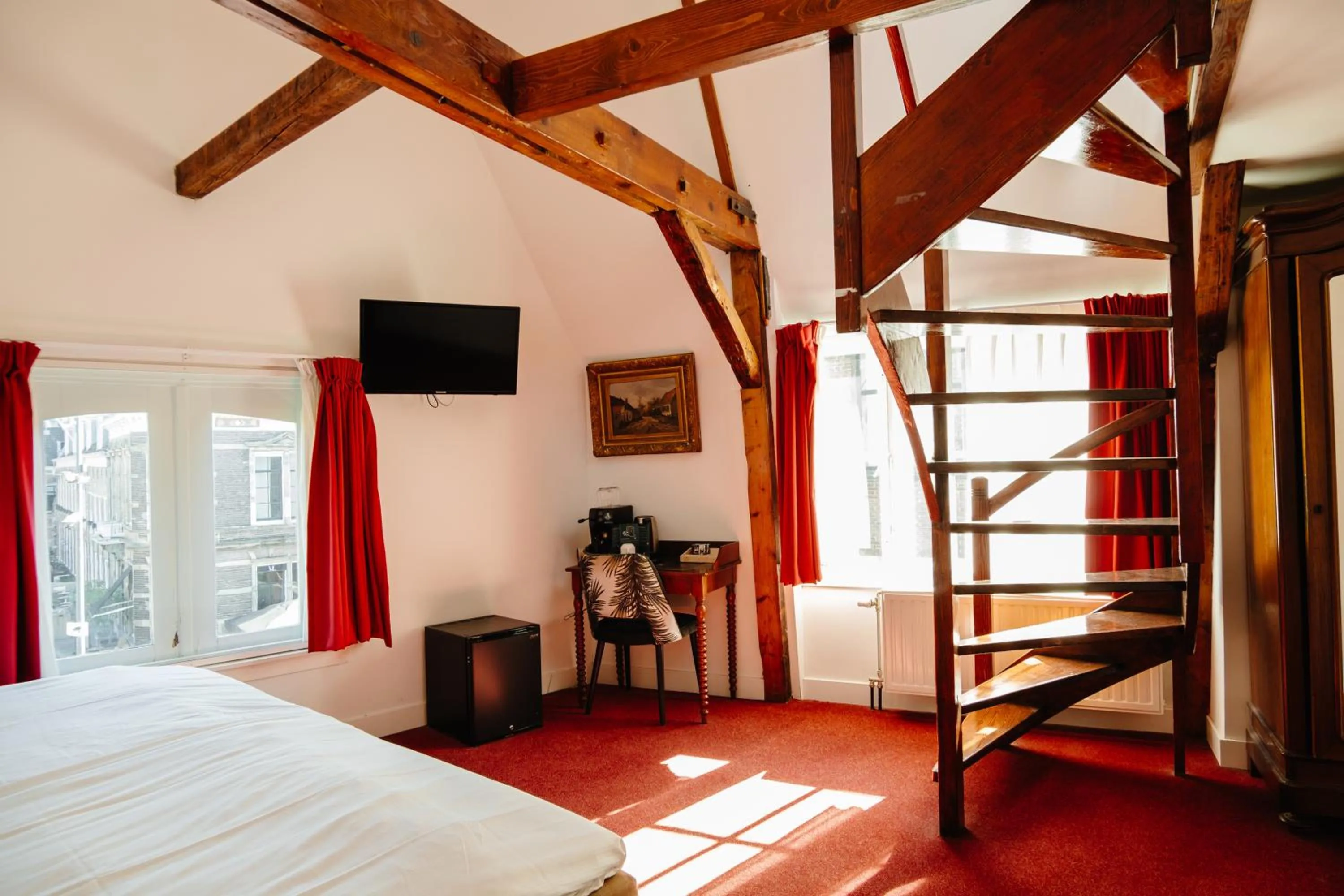 Bed in Ambassador City Centre Hotel