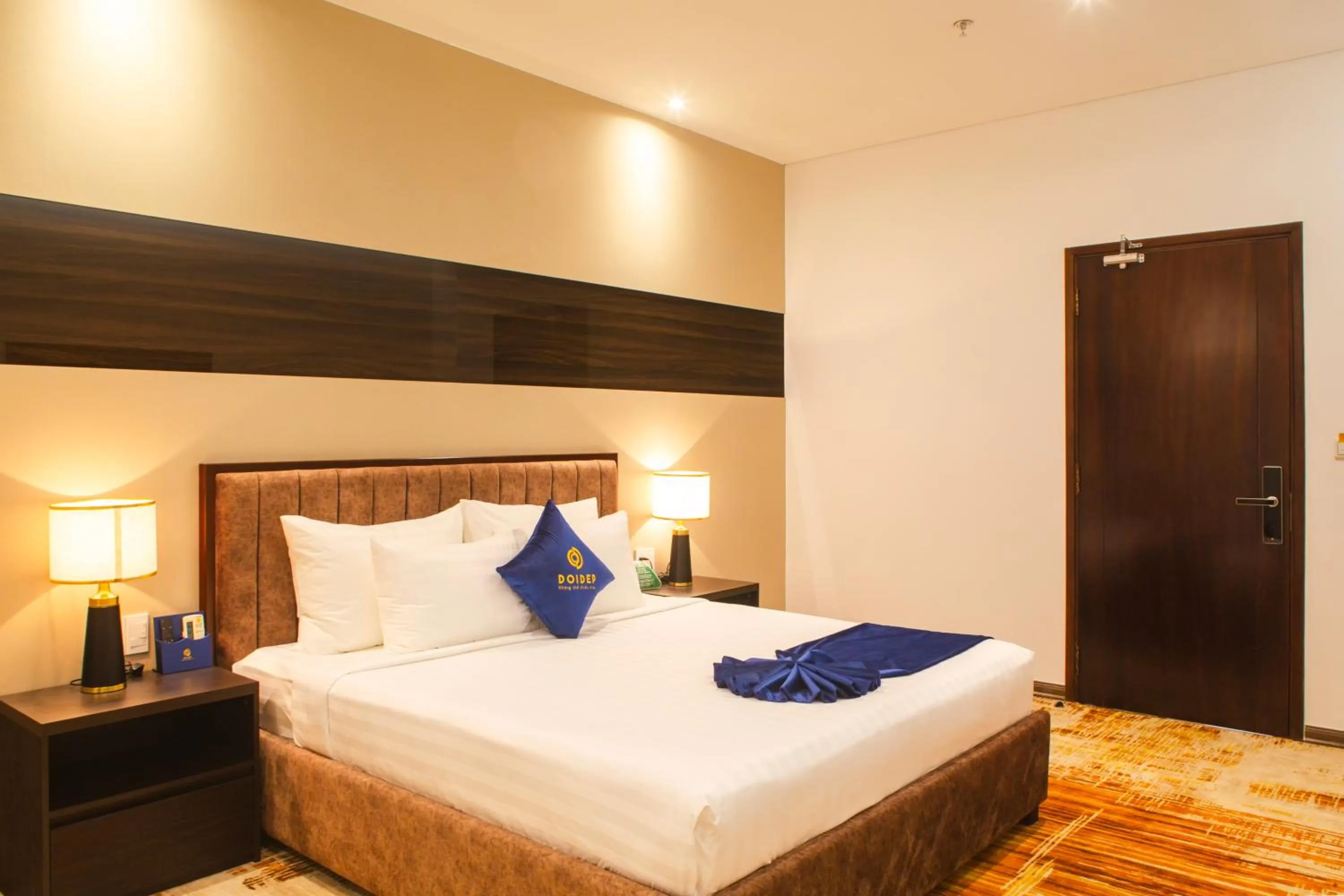 Bed in SANDALS AQUILA HOTEL