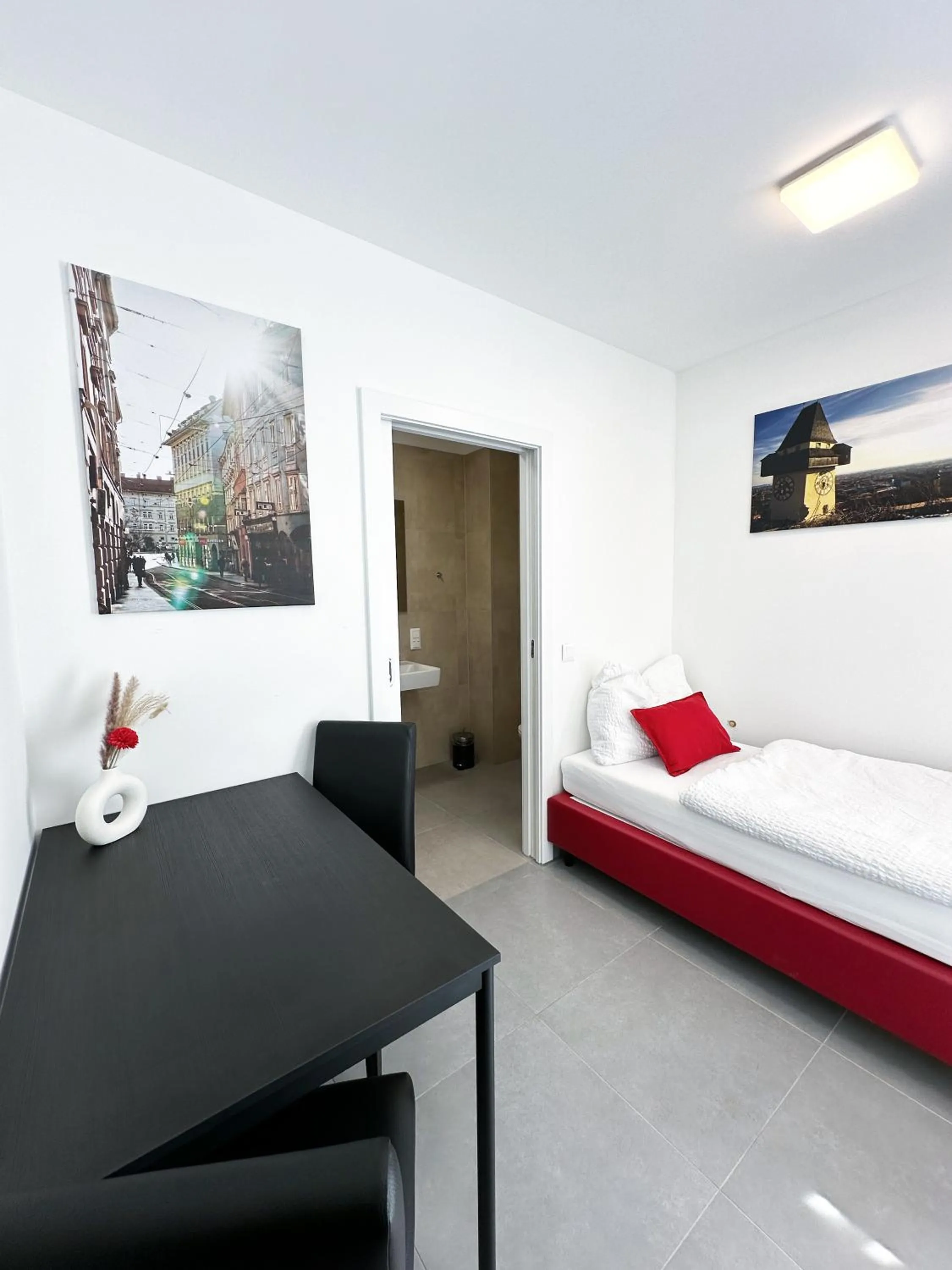 Bed in Grazora Living Apartments