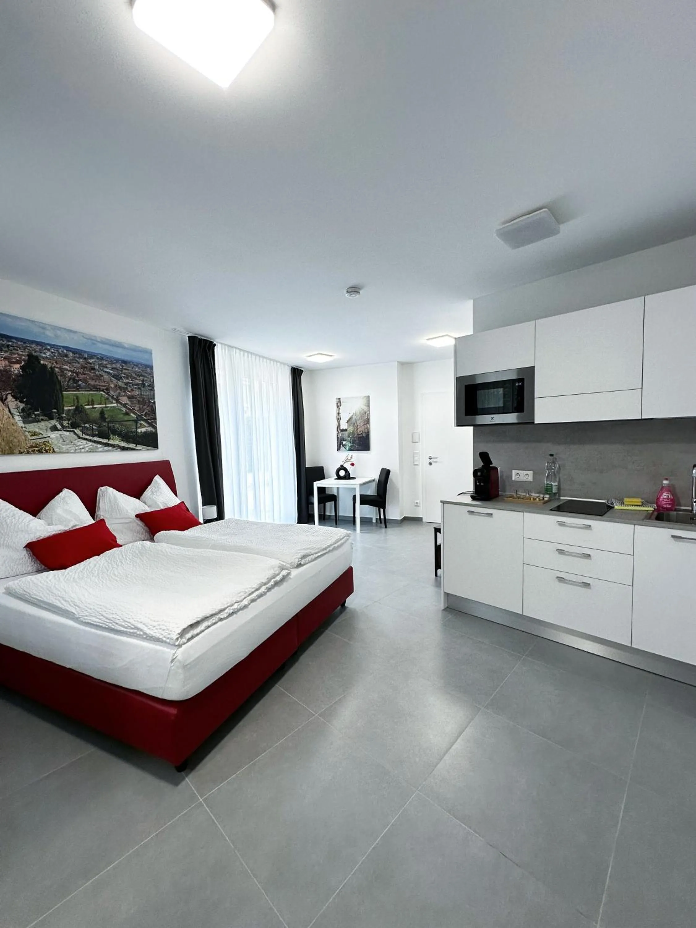Kitchen or kitchenette, Bed in Grazora Living Apartments