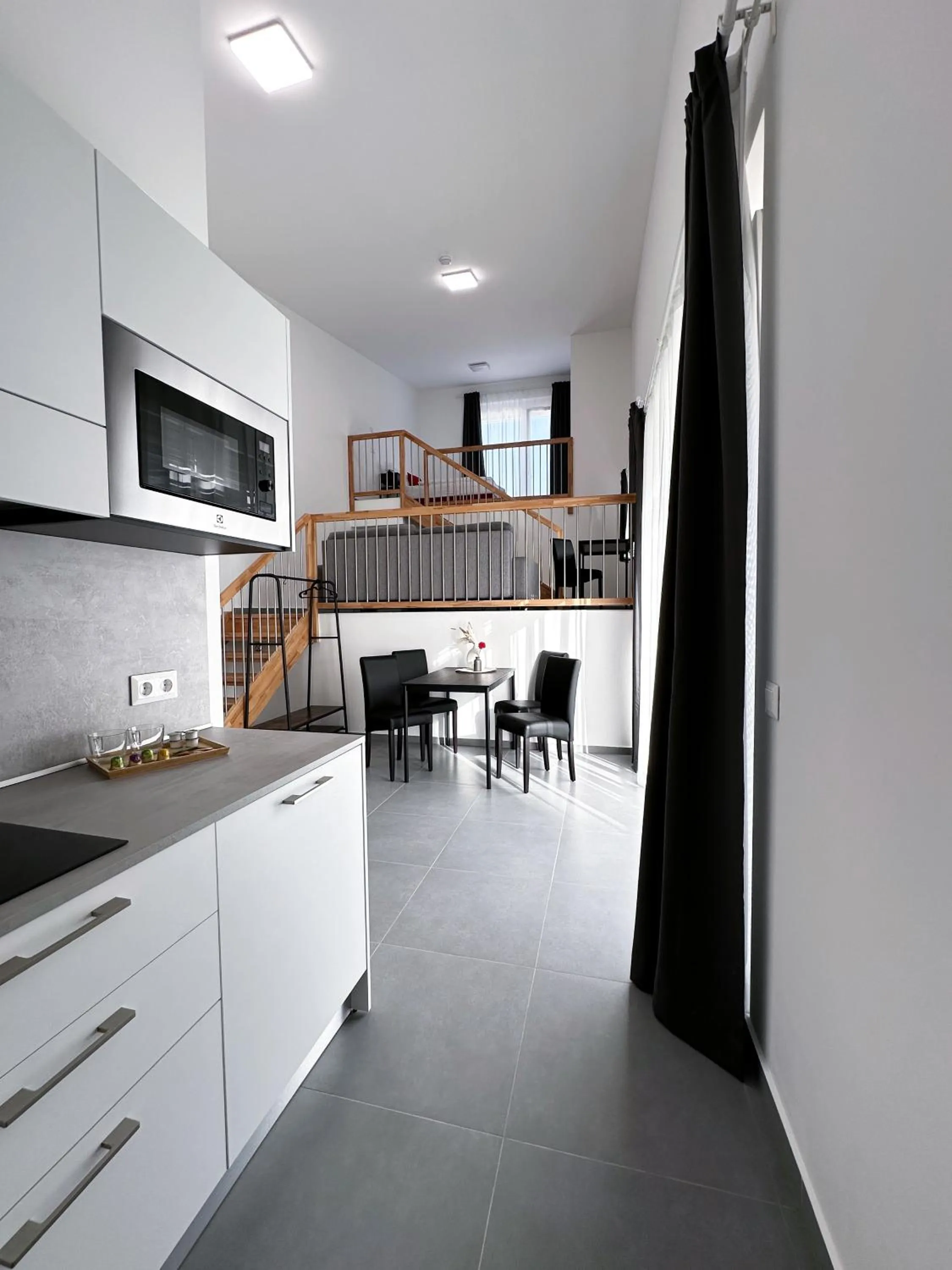 Kitchen or kitchenette in Grazora Living Apartments