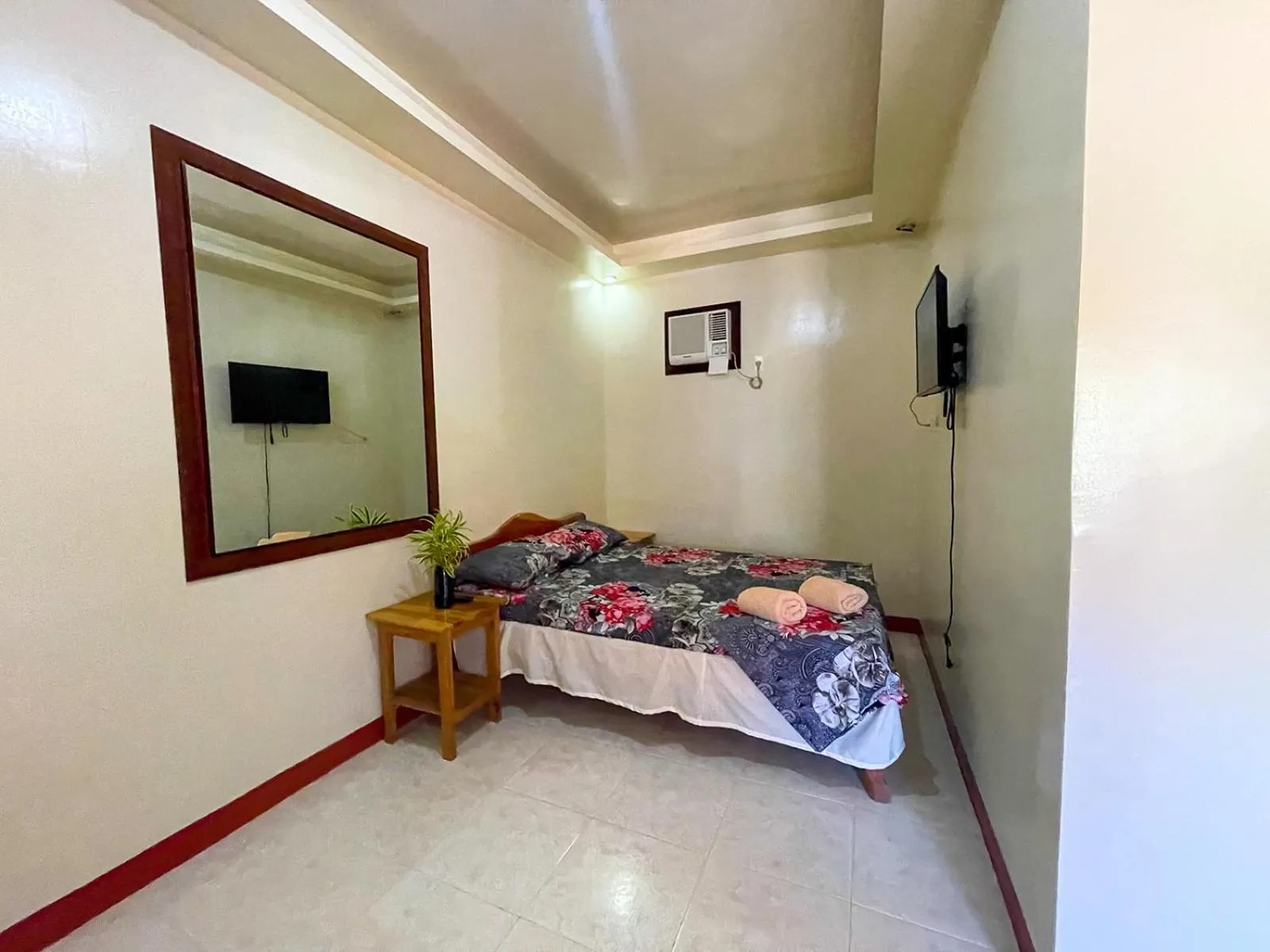 Bed in Delgados Resort Puerto Galera powered by Cocotel