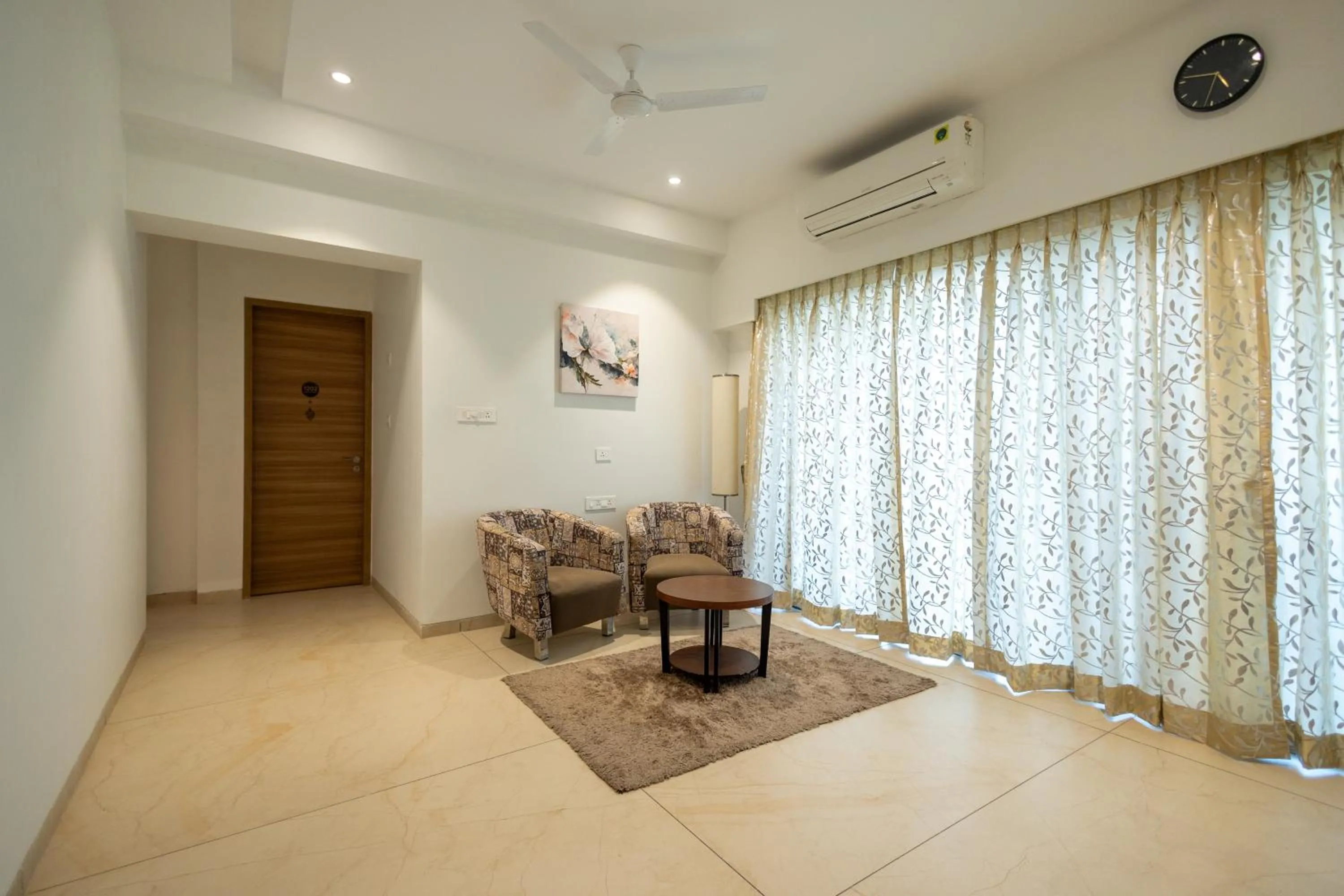 Communal lounge/ TV room in Freesia Residency By Express Inn - Navi Mumbai