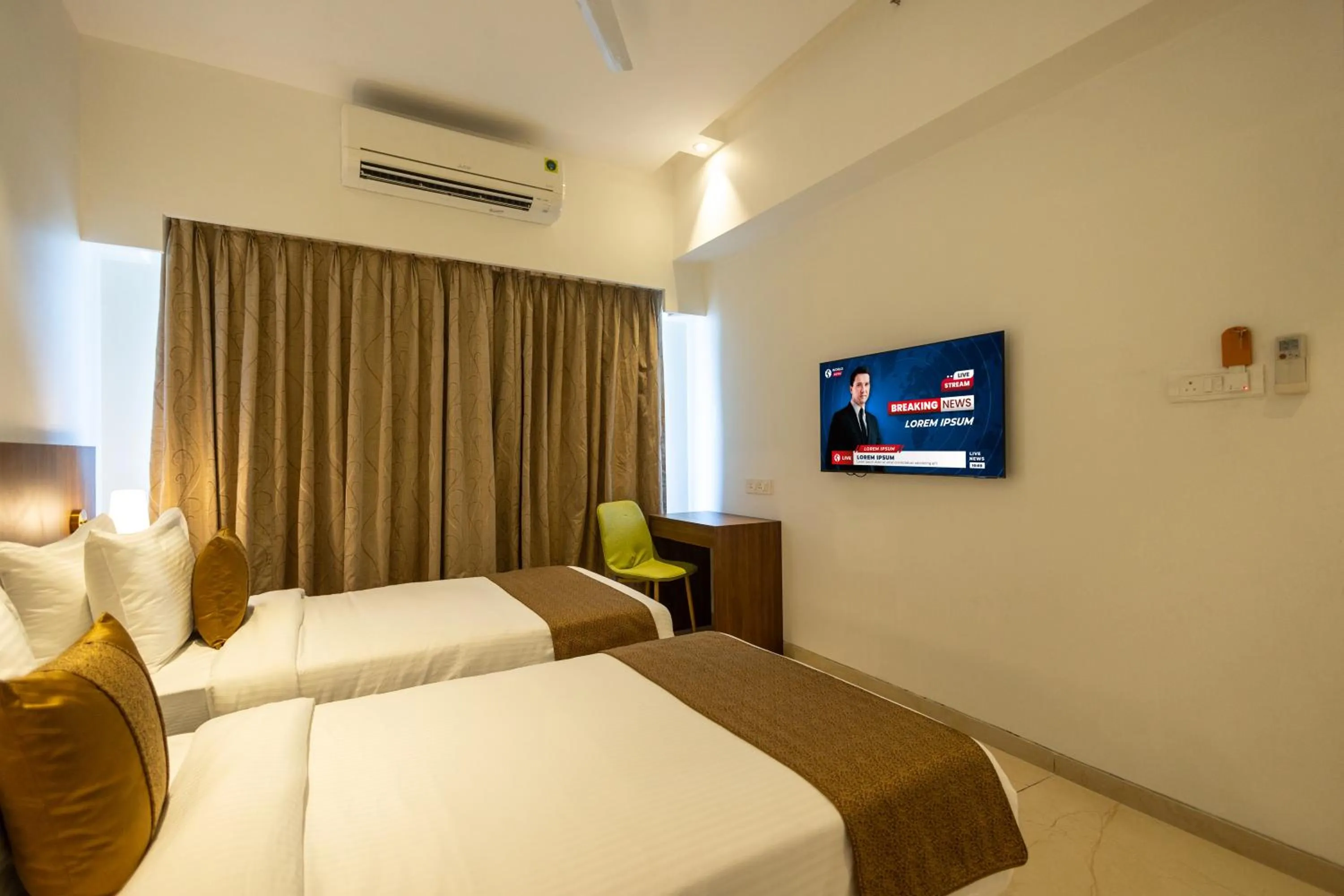 Communal lounge/ TV room, Bed in Freesia Residency By Express Inn - Navi Mumbai