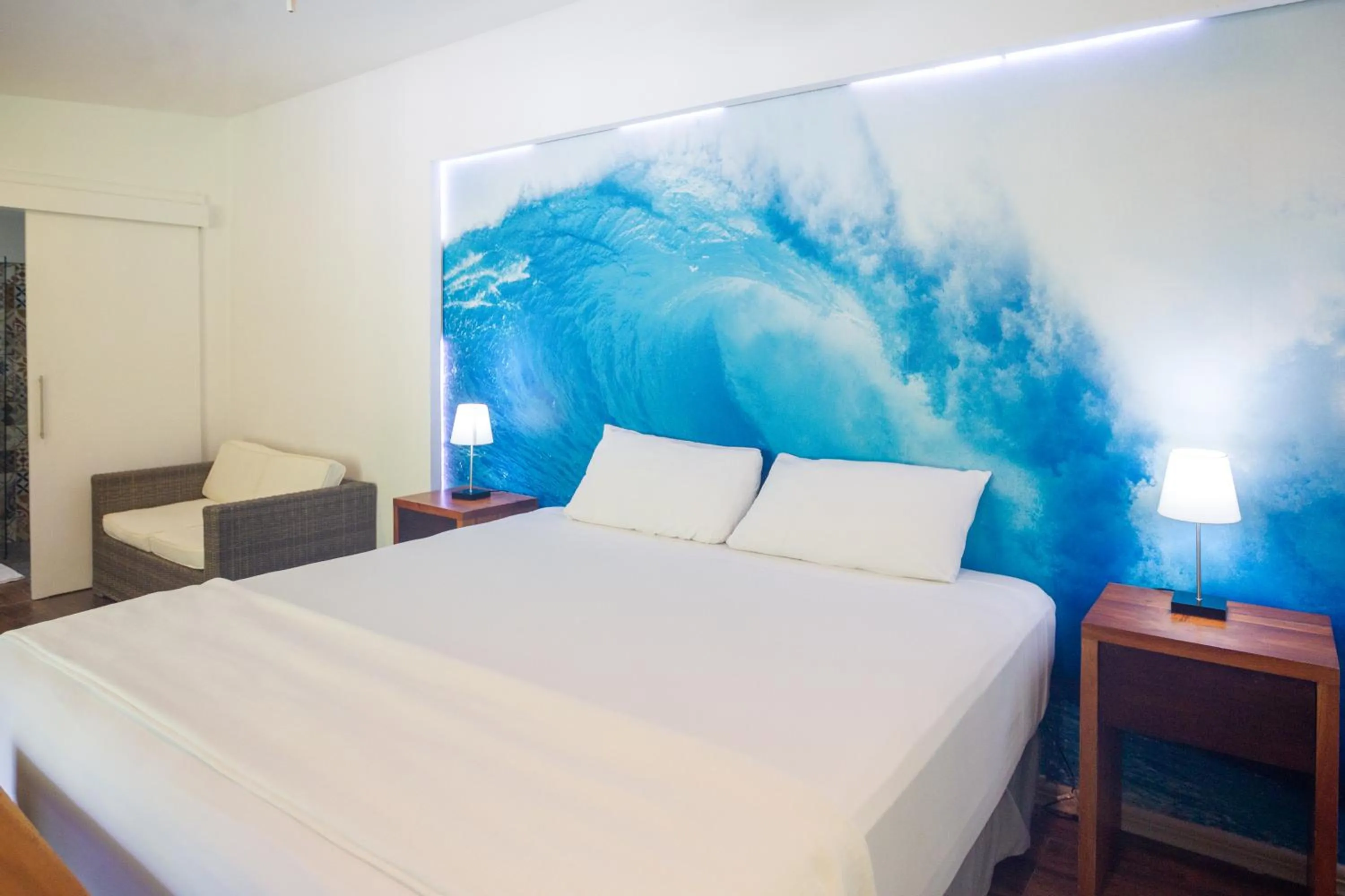 Bed in La Vela Boutique Hotel