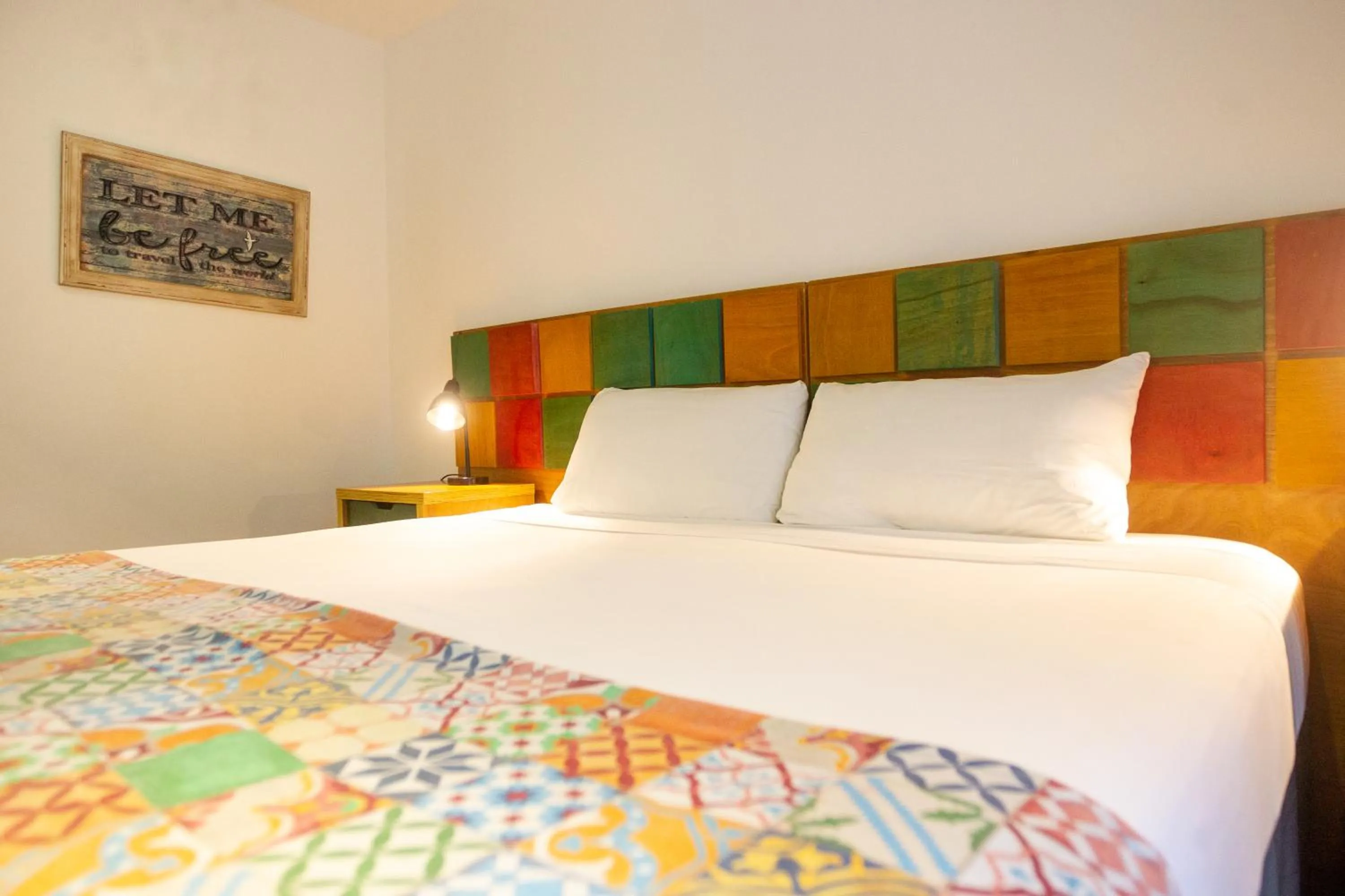 Bed in La Vela Boutique Hotel