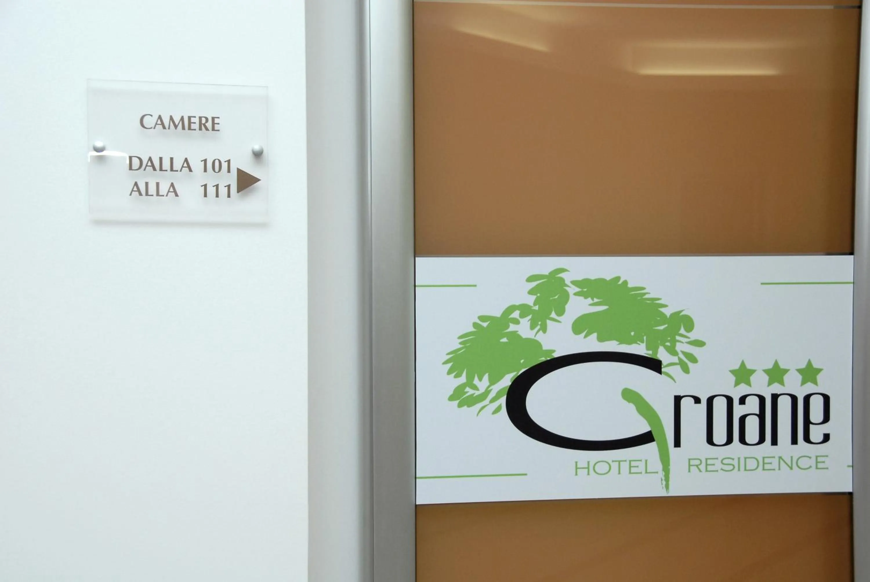Property logo or sign in Groane Hotel Residence