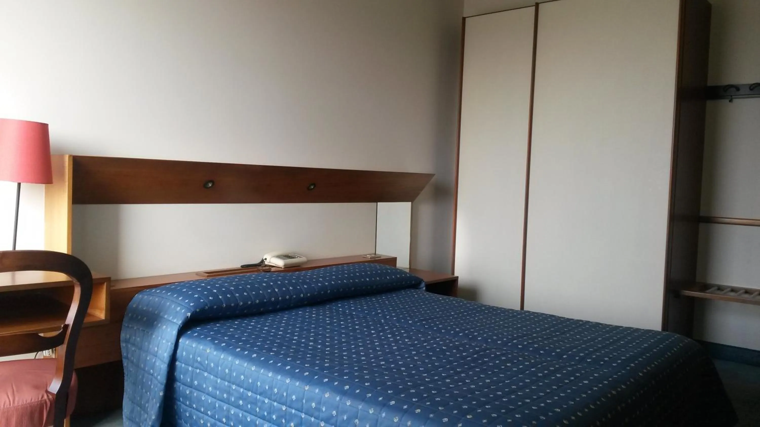 Bed in Cravero Rooms