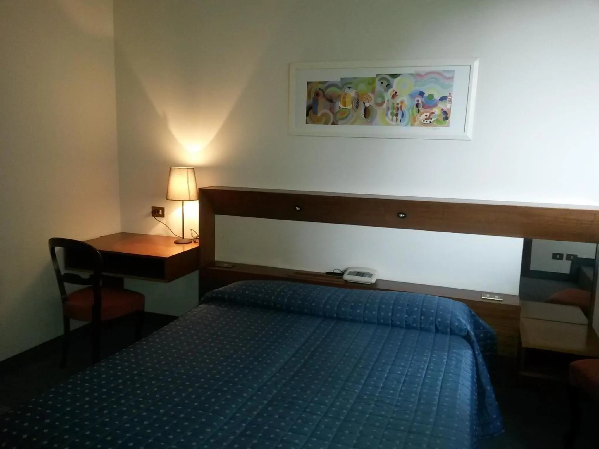 Bed in Cravero Rooms