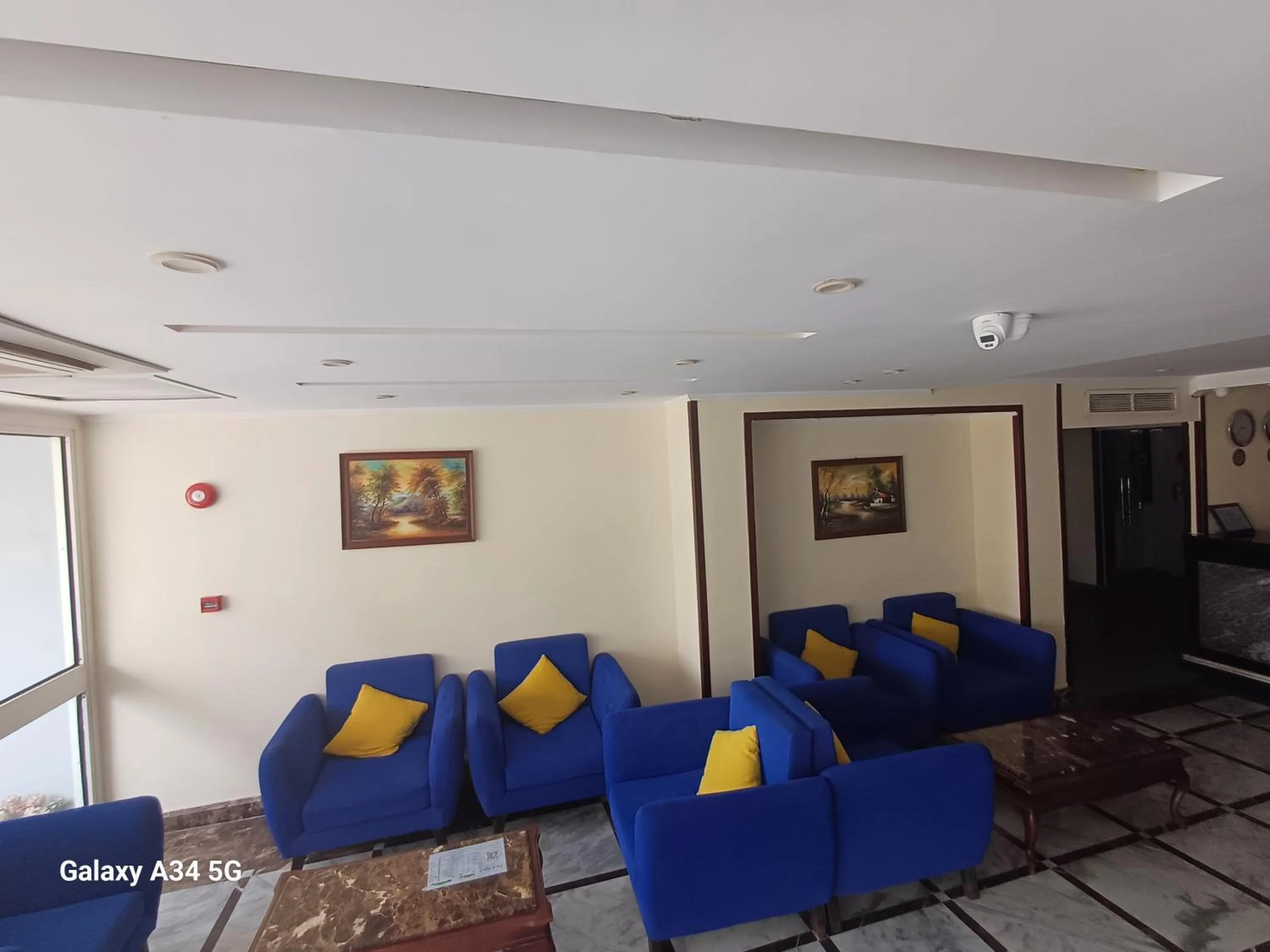 Communal lounge/ TV room in Palm Inn Hotel Hurghda