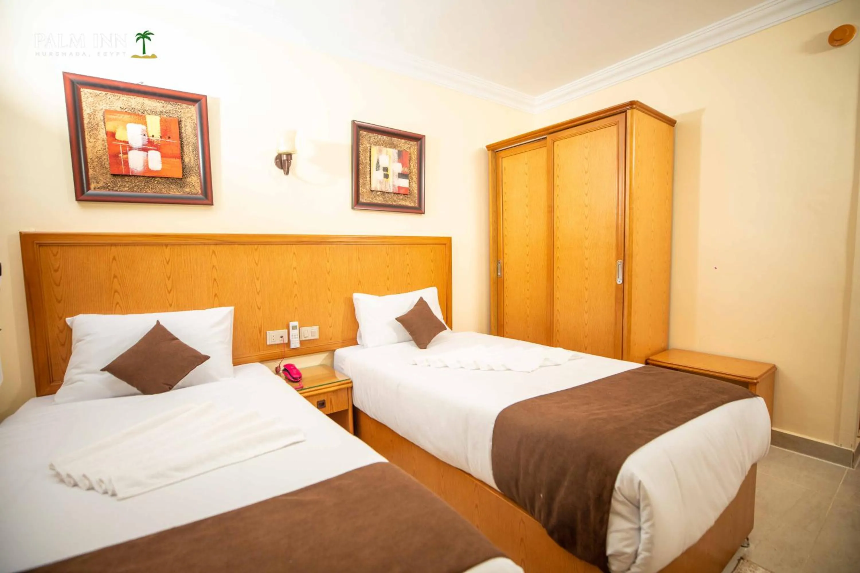 Bed in Palm Inn Hotel Hurghda