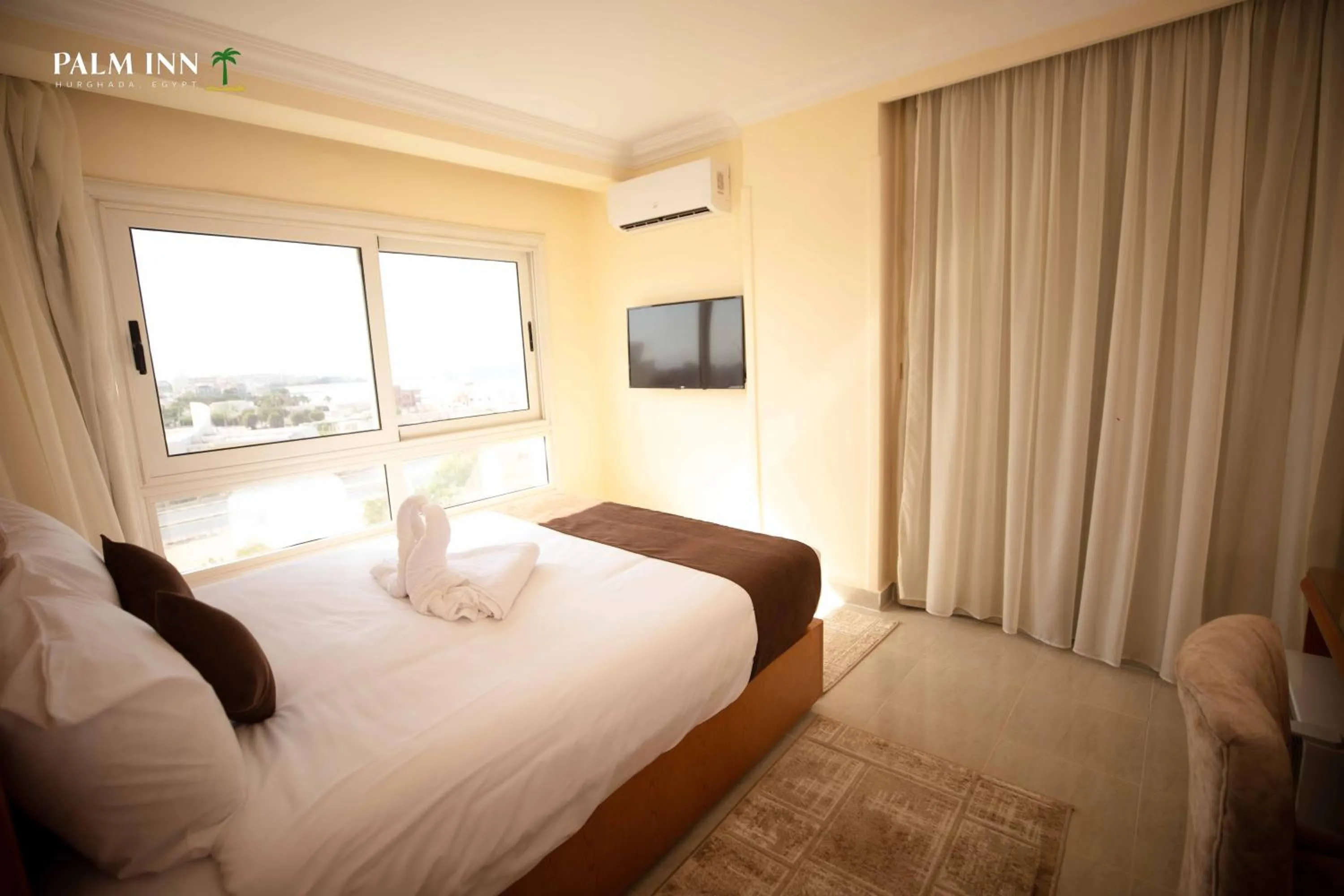 TV and multimedia, Bed in Palm Inn Hotel Hurghda