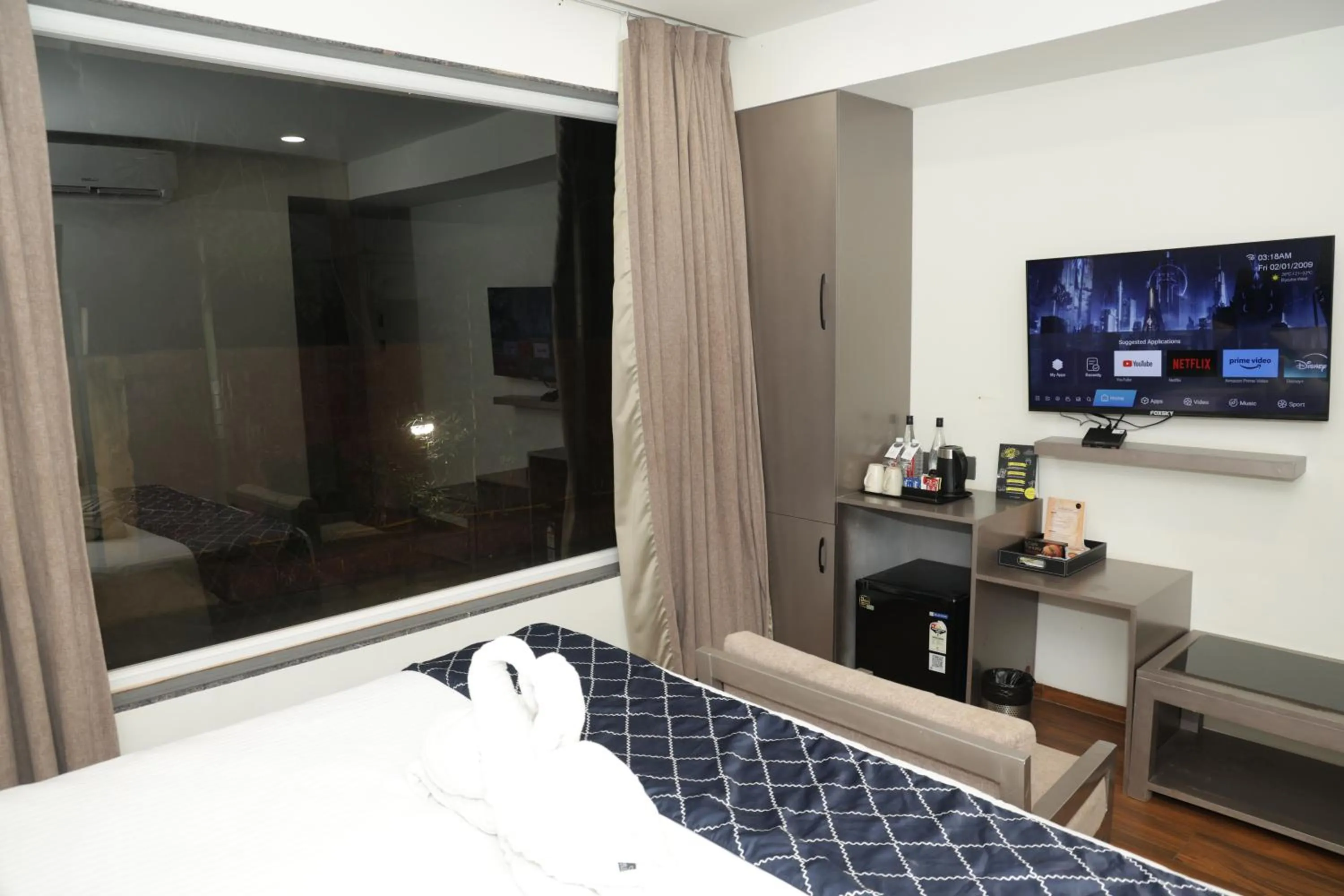 TV and multimedia, Bed in Grand Continent Anjuna A Sarovar Portico Affiliate Hotel