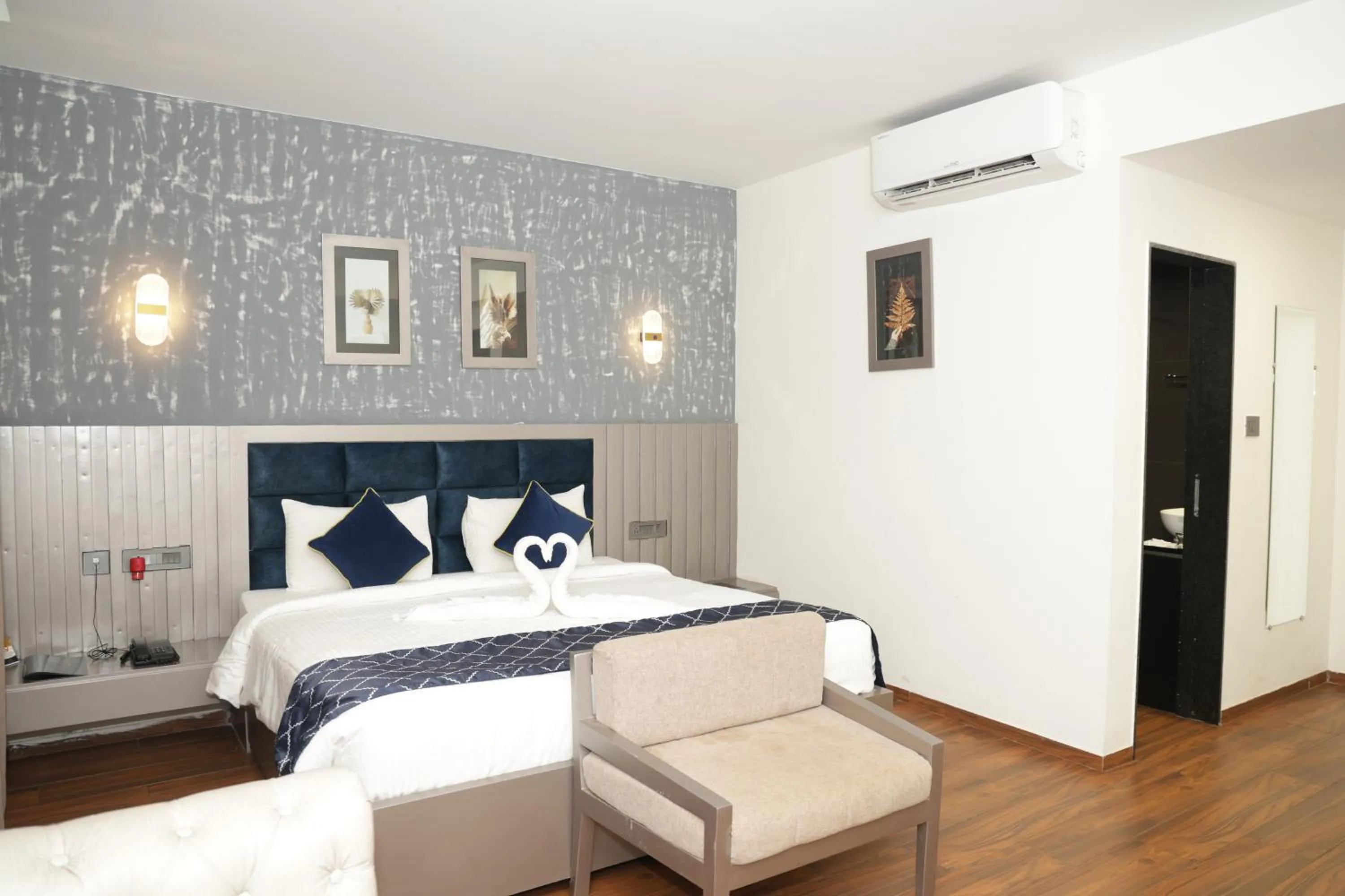 Living room, Bed in Grand Continent Anjuna A Sarovar Portico Affiliate Hotel